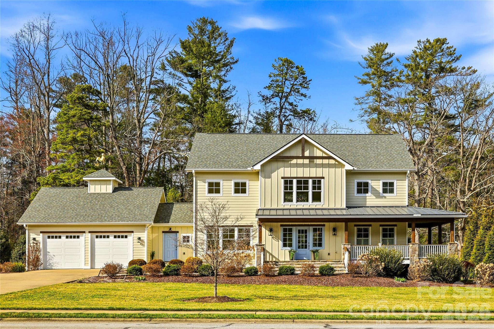 **Back on market, no fault of the home, buyer had change of plans** Welcome to 74 Shipman Parkway, a stunning custom farmhouse in the desirable gated community of Berwick Downs in beautiful Flat Rock. On approximately 0.77 acres, this exceptional home offers privacy, elegant design and a peaceful mountain setting. Go inside to an impressive entry with soaring vaulted ceilings that open into a spacious great room featuring a striking stone fireplace. The thoughtfully designed main level includes a cozy den and a chef’s kitchen with granite countertops and a breakfast bar, ideal for entertaining or everyday living. The luxurious primary suite is also on the main level and features a spa-inspired walk-in shower and generous space to unwind. Upstairs, you’ll find three additional bedrooms and a full bath, offering comfortable accommodations for family or guests. The home also features a convenient mudroom/laundry area with a utility sink and ample storage. Outside, the beautifully landscaped and level yard creates a private retreat with plenty of space to relax, garden, or entertain. Just minutes from shopping, dining, and outdoor recreation, this home offers a balance of refined living and mountain charm.