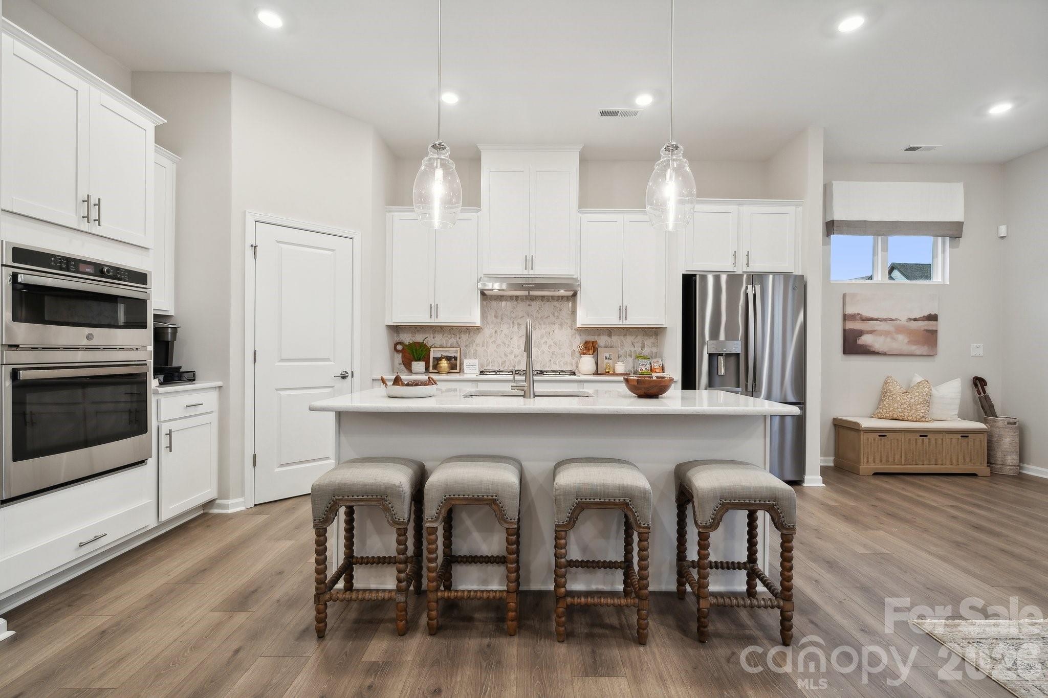 What's Special: Dedicated Study | No Rear Neighbors | Covered Patio | Premium Location. New Construction - August Completion! Built by America's Most Trusted Home Builder. Welcome to the Avon at 8683 Miles Gap Road in Ridge at Sugar Creek! This thoughtfully designed townhome welcomes you with a foyer that flows into an open-concept kitchen featuring a walk-in pantry and casual dining area, creating an inviting space for everyday living. Beyond the kitchen, a conveniently located half bath and covered patio add comfort and flexibility, while a spacious great room at the front of the home completes the first floor. Upstairs, a private study and tech space greet you at the top of the stairs. Two secondary bedrooms with a shared full bathroom sit at the front of the home, along with a centrally located laundry room. The primary bedroom is tucked away for added privacy and includes an attached bathroom with dual sink vanity, walk-in shower with built-in ledge, and a linen closet. Pool and cabana now open! Ridge at Sugar Creek in Indian Land, SC, offers a welcoming lifestyle with a new pool and planned greenway trail. Just 4.5 miles from Ballantyne, you’ll enjoy easy access to I-77, I-485, and the Ballantyne Bowl’s dining and events. Commuting is simple with quick routes to Uptown Charlotte and Ballantyne Corporate Park. Additional Highlights Include: gourmet kitchen, walk-in shower with a ledge in the primary bathroom, and a study in place of a loft. Photos are for representative purposes only. MLS#4381156