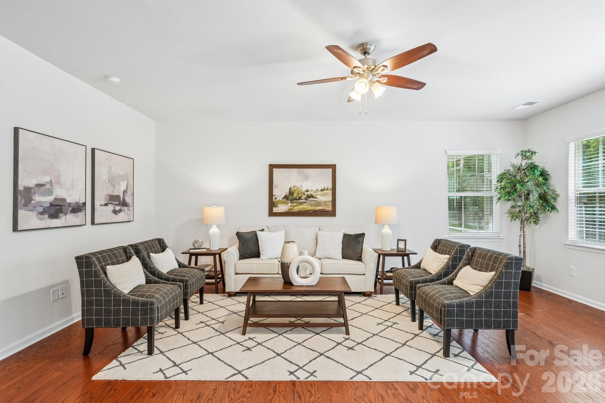 NEW PRICE! $525K IS AN UNBELIEVABLE PRICE FOR THIS COMMUNITY.  HOUSE IS MOVE IN READY!

Please see the AI renderings of a stamped concrete patio option. Sellers are willing to negotiate.

Get ready to live your best life in this stunning one-level home, tucked right into an amazingly vibrant 55+ community! Whether you love hosting epic get-togethers or just kicking back in style, this bright, open-concept beauty is packed with premium upgrades and ready for you.

Here’s a sneak peek at what makes it so special:

A Kitchen Made for Entertaining: We’re talking top-tier finishes, endless cabinet space, and an oversized granite island that practically begs for a charcuterie board and good conversation. (Yes, the stainless steel appliances are included!)

Your Personal Oasis: The Owner’s Retreat is a true sanctuary. Treat yourself to the spa-inspired bathroom,    appreciate the large walk-in closet, or curl up in the cozy reading nook before stepping right out onto your private screened-in porch.

Room for Everything: With two additional bedrooms, a second full bath, and a cute powder room, you have endless options. Set up the ultimate home office, a quiet library, or a welcoming guest wing!

Dine & Unwind: Host your next dinner party in a gorgeous, sunlit dining room complete with elegant wainscoting. Then, wind down outside on the paver patio surrounded by lush, mature trees.

Plus, you can say goodbye to yard work— front and rear lawn maintenance is covered! That means more time to enjoy the incredible, resort-style perks:

Splash & Relax: A heated pool with dedicated lap lanes (open May 1 – Oct 31) and beautiful spaces to mingle.

Get Creative: Tap into your inner artist at the Community Cabins, featuring studios for pottery, art, and textiles, plus a library and a billiards/game room.

Stay Active: Break a sweat in the fully equipped gym or yoga studio, hit the pickleball and tennis courts, or let your furry best friend run wild in the large dog park.

Lake Life Calling: Located right on Mountain Island Lake, you’ll love exploring the scenic trails. And keep an eye out for the upcoming marina, complete with boat slips and a watercraft launch!