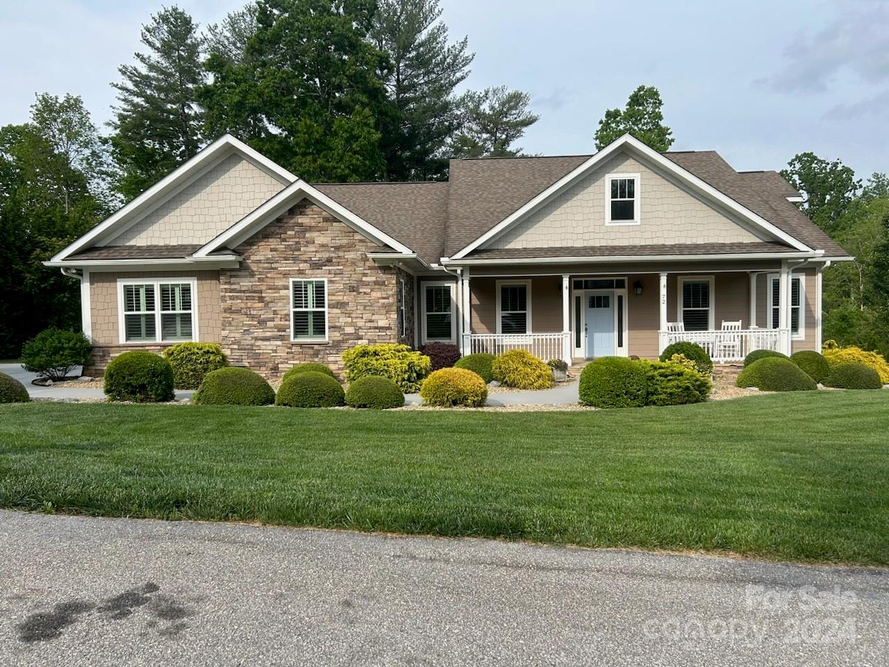 Expect to fall in love with this amazing home.  Shows like new! Light & Open featuring custom moldings, stone accent walls, built-ins & so much more.  Split bedroom arrangement.  In absolute pristine condition.  Spacious great RM w/vaulted ceilings, skylights, built-in shelving & FP opens onto spacious deck overlooking private lushly landscaped back lawn. Fabulous kitchen w/handsome cabinetry, granite countertops, SS appliances, breakfast bar & eating area. Formal dining RM offers coffered ceiling & wainscoting. Gorgeous primary bedroom suite features double walk-in closets, spacious walk-in shower & jetted tub. Oversized garage w/plenty of work area & storage. Relax on fantastic screen porch or oversized rocking chair front porch overlooking this meticulously cared for lawn.  amenities include tankless water heater & generator.