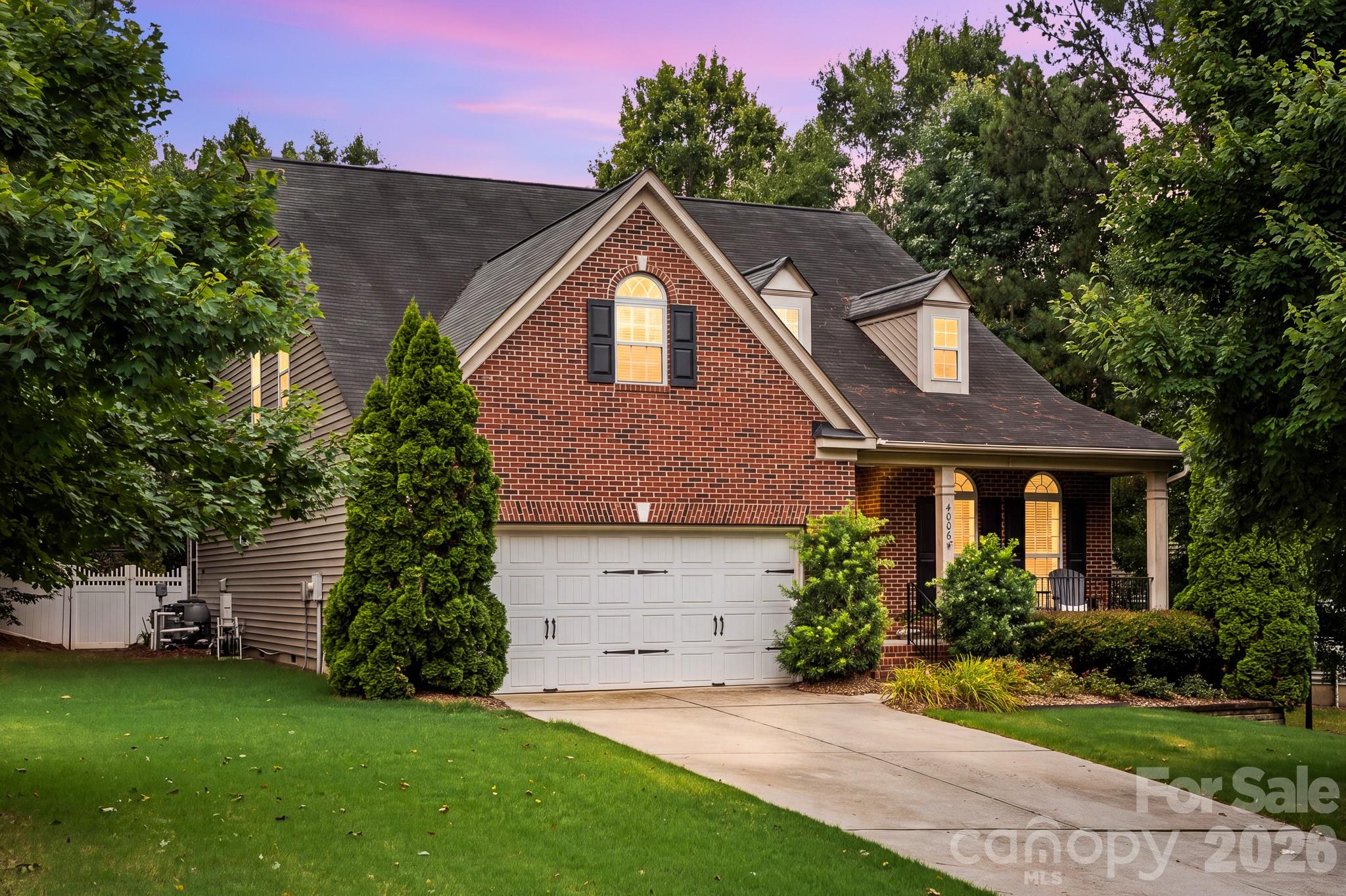 Immaculate and gorgeous inside and out!  1.5 story home in sought after Heritage Hall in Indian Land near Ballantyne and Fort Mill.  Three bedrooms (two on the main level) and 3 full baths!  Gleaming hardwood floors in the common areas with open floor plan and lots of natural light.  Large Great Room with soaring ceiling, surround sound and stone fireplace, overlooking the beautiful professionally landscaped yard with salt water pool, hot tub, firepit and irrigation.  Lovely formal dining room and eat in kitchen!  Kitchen has lots of storage with high-end cabinetry, solid surface countertops, custom backsplash and lots of windows and french door.  Large primary retreat is tucked away on the main level, with luxury bath, great storage and large walk in closet.  Secondary bedroom down has full bath nearby as does the third bedroom off a small loft upstairs.  Amazing walk in attic storage off upstairs bedroom.  This is a must see floor plan not to mention the resort like outdoor living area!  Low Lancaster County taxes!  Close to dining, shopping, and schools!
