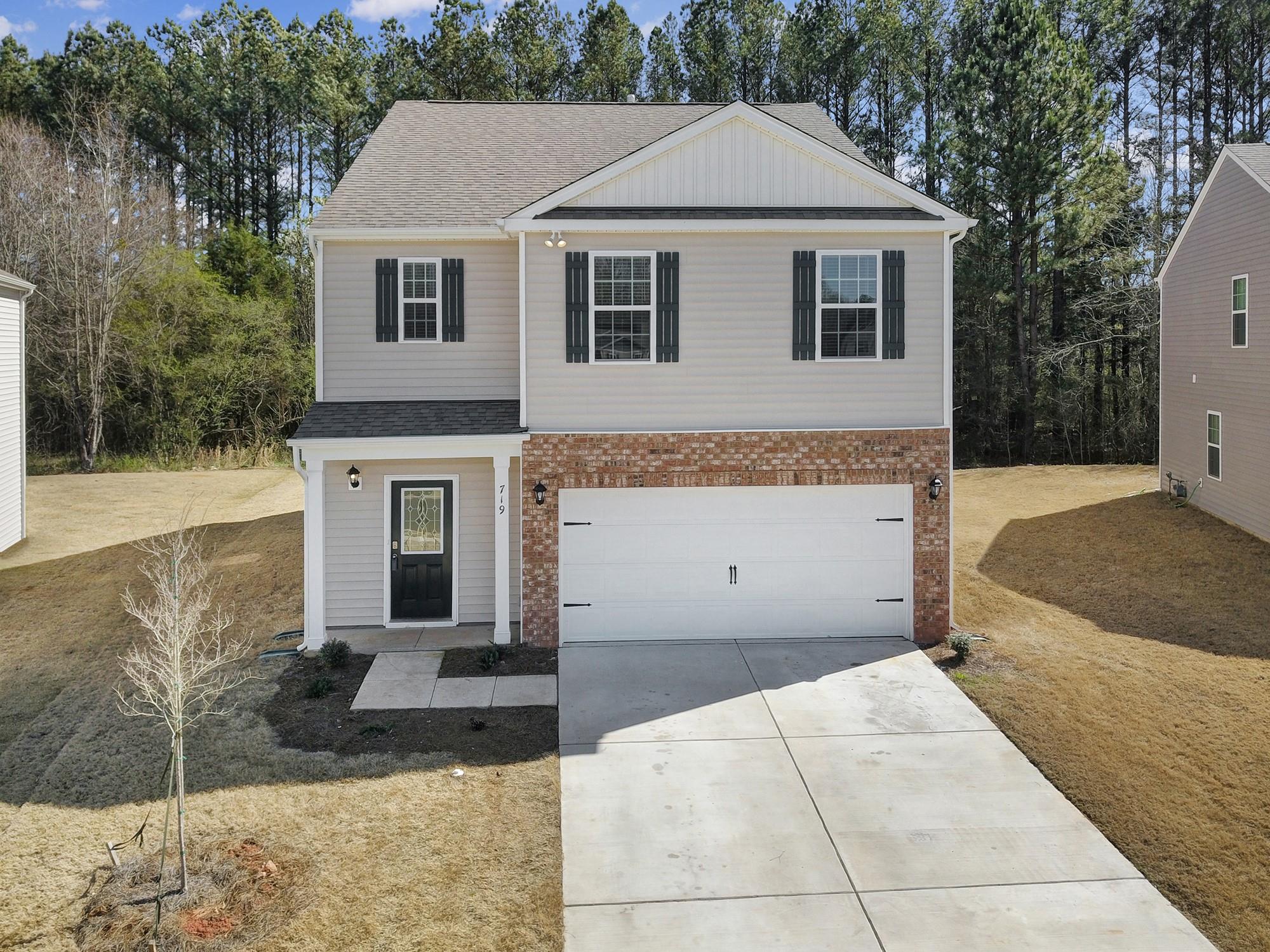 Built in 2022, this beautiful home is located in the brand new Boshamer Farms community in Clover, SC. 
The bright and open floor plan has everything you would expect in a new home as well as a bedroom & full bathroom on the main level. Kitchen features include granite countertops, tile backsplash, and stainless steel appliances including a gas range! Modern and durable laminate wood flooring by Mowhawk flooring, digital thermostat, keypad front door lock, and more! This impeccably maintained home is ready for the next owner to put their own personal touch on it! Placed perfectly on a spacious cul-de-sac lot, bordering large, mature trees and steps away from a convenient greenspace and playground. Minutes to Hwy 321, I-85, Shopping, Kings Mountain State Park, Crowders Mountain State Park and Lake Wylie!