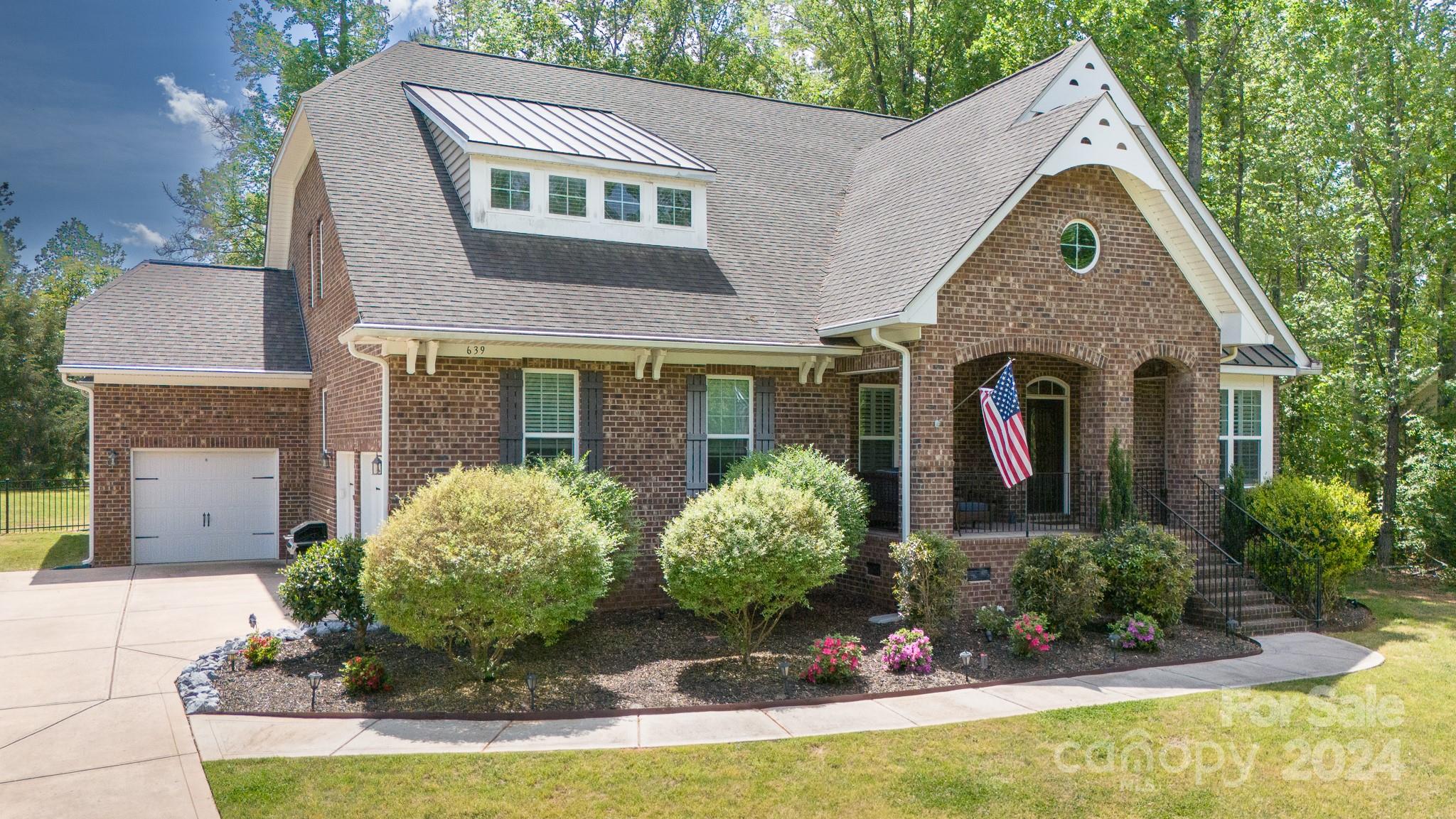Lovely all brick home with 4 bedrooms and 3 full baths. Primary bedroom is on the main level. Large 1 acre lot. Covered front and rear porches. Open concept with large kitchen island, granite countertops. Gas cooktop with all stainless steel appliances. Upstairs features a large loft, bedroom and a full bath. Attic area has storage shelves built in and ceiling insulation to reduce the heat. Has three garage spaces. The exterior features an in-ground irrigation system, screened rear porch and a paver patio with a firepit.