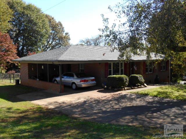 This 3 bedroom 2 full bath brick ranch on a large, corner lot in Morganton offers one level living with a fenced backyard that is perfect for pets.  This home offers 3 large bedrooms with hardwood flooring, ceramic tile in the kitchen, tiled baths, make this home easy to care for.  The attached carport will keep you dry when bringing in the groceries!  Seller offering $2,500 towards closing costs and Home Warranty with acceptable offer!