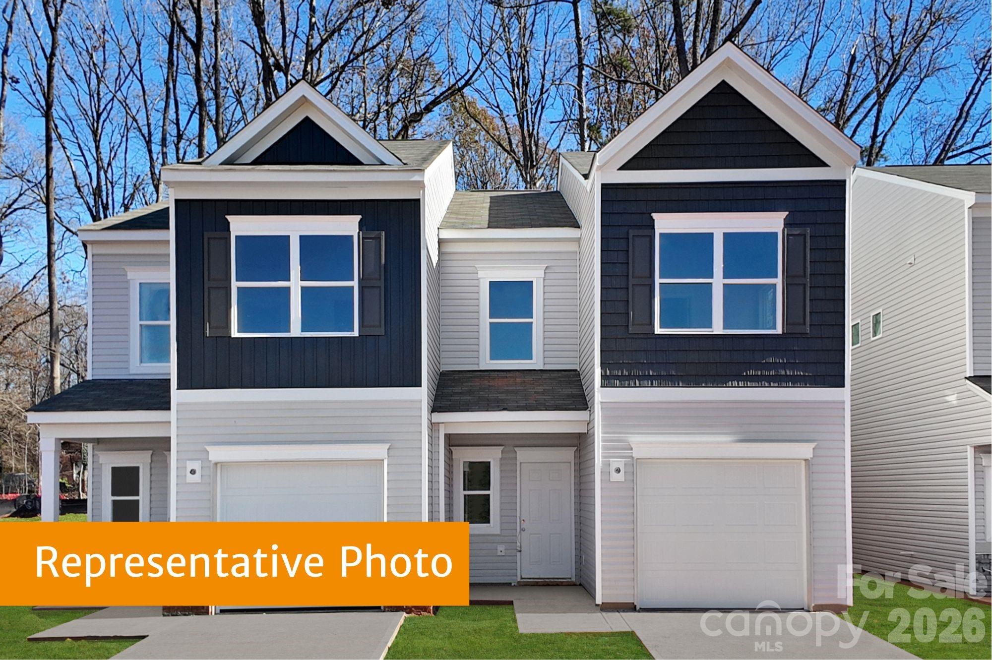 Step into the Rutledge floorplan at Hickory Glen, ideally situated just 10 minutes from Uptown Charlotte. This low-maintenance, two-story end-unit townhome offers 1,443 square feet of thoughtfully designed living space with 3 bedrooms and 2.5 bathrooms. The open-concept main level features a modern kitchen with 36" cabinets, granite countertops, an island, stainless steel appliances, and a pantry. The open kitchen transitions smoothly into the family room and dining area, enhancing the home’s functional and inviting layout. 

Upstairs, the primary suite includes a walk-in closet and a private en-suite bath with dual quartz vanities and a large shower. Two additional bedrooms, a full bath, and a conveniently located laundry room complete the upper level. Hickory Glen is an intimate boutique community of just 46 duet-style homes, with every residence offering the privacy and natural light of a coveted end unit.