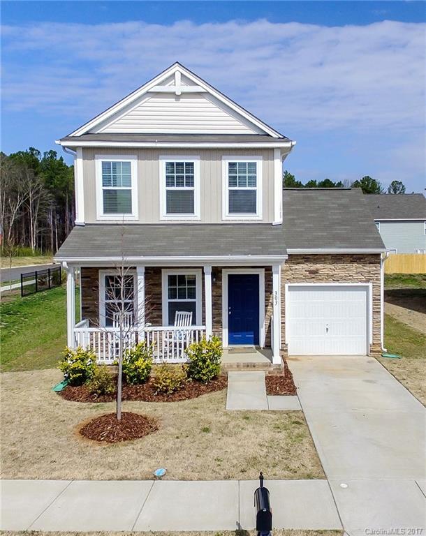 Gorgeous 3BR/2.5BA home in Rock Hill neighborhood of Roddey Park! Clean neutral luxury finishes: granite, white cabinets, hardwoods, stainless steel appliances, eat in bar/island, tile backsplash, upgraded lighting. Open floorplan concept, perfect for entertaining. Fenced yard for privacy and covered rocking chair front porch as well inviting you home.  This home is immaculate, well maintained, and move in ready!