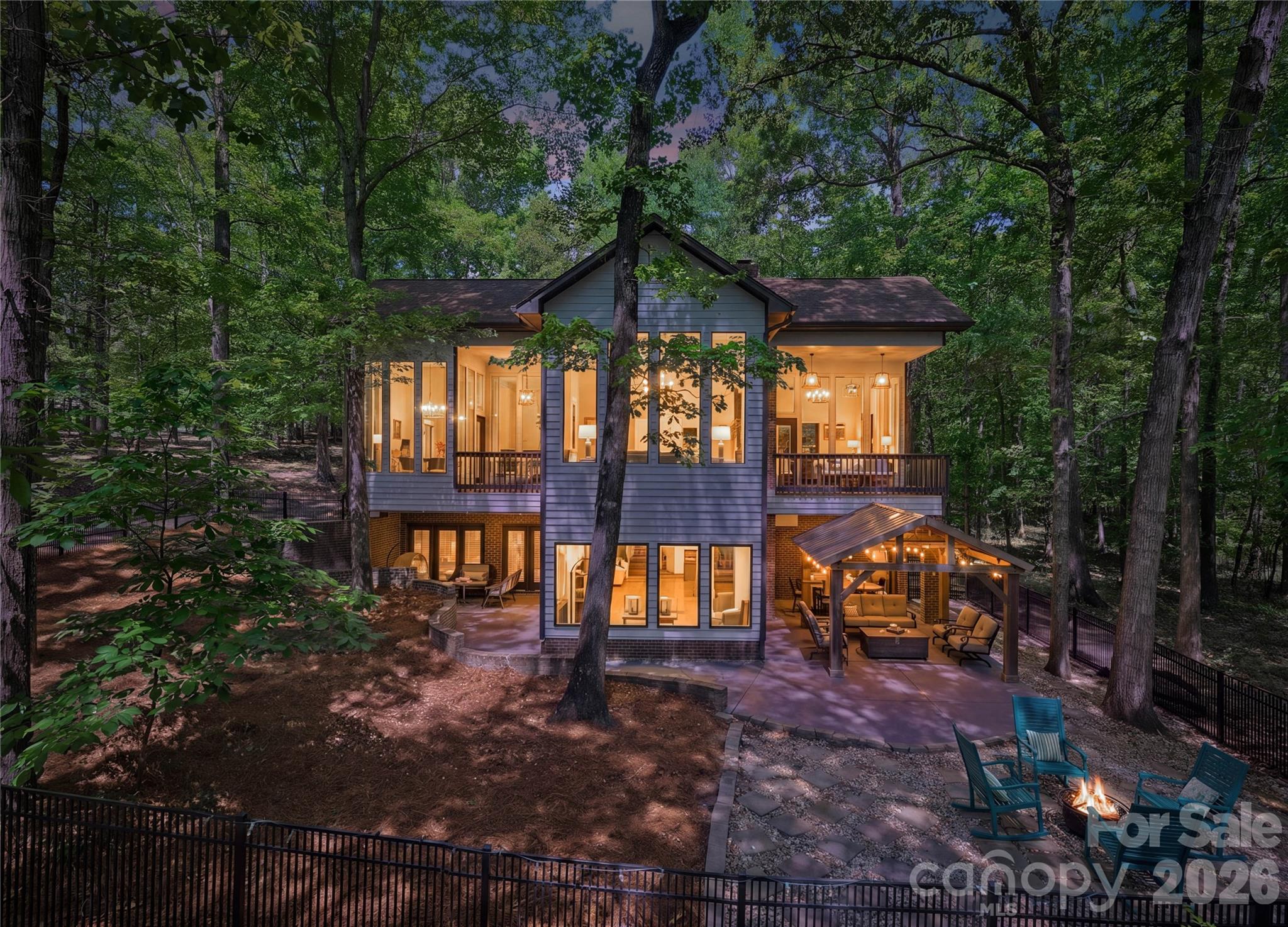 BACK ON MARKET AT NO FAULT OF THE SELLERS. Tucked away on a private, wooded 1.26-acre lot, this beautifully renovated retreat offers the perfect blend of comfort, character, and everyday livability in one of Weddington’s most desirable locations. With over 4,000 square feet, 4 bedrooms, and a fully finished basement, this home invites you to slow down, unwind, and truly enjoy where you live. From the moment you arrive—passing a charming horse farm just down the street—you’ll feel the peaceful, estate-style setting that defines this area. Inside, tons of natural light pour through beautiful, oversized windows, highlighting the home’s inviting spaces and thoughtful updates, including an updated kitchen designed for both function and style. The layout features a primary bedroom on the main level, offering convenience and a private place to recharge, with its own porch access for quiet mornings or evening wind-downs. Designed with lifestyle in mind, this home truly shines when it comes to indoor-outdoor living. Enjoy multiple outdoor spaces, from the welcoming front porch to a private porch off the primary suite, along with covered areas, expansive patios, and a fire pit—perfect for gathering with friends, hosting, or simply enjoying the peaceful surroundings year-round. The fully finished basement expands your living space with a dedicated office and a spacious recreation room, ideal for movie nights, game nights, entertaining, or relaxing. Whether you’re hosting guests or enjoying a cozy night in, this home offers flexibility for every stage of life. Surrounded by mature trees and natural privacy, the setting feels like your own personal escape—yet you’re just minutes from shopping, dining, and everyday conveniences. Located in the highly sought-after Weddington school district, this home combines tranquility with top-tier location. This is more than a home—it’s a lifestyle.