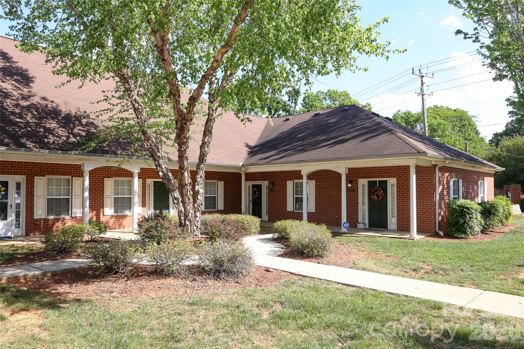 Desirable corner 2 bed/2 bath unit situated, just 4 miles to UNCC, 15 min to city center, and easy access to I-85 and 77 for commuters! Upon entering, you'll be greeted by a wonderful sitting room with trey ceiling and beautifully flowing LVP flooring that leads you right into your spacious kitchen. Kitchen features ample space for a large table and open to your large family room. Entertaining family and friends here is a breeze! Light pours in your sliding glass doors that lead you to your large, private patio. Back inside, you'll find a spacious primary bedroom with Trey ceiling, 2 full bathrooms and a sizable secondary bedroom, ideal for a roommate, guests or a home office if needed! Washer, Dryer and Refrigerator to convey.
