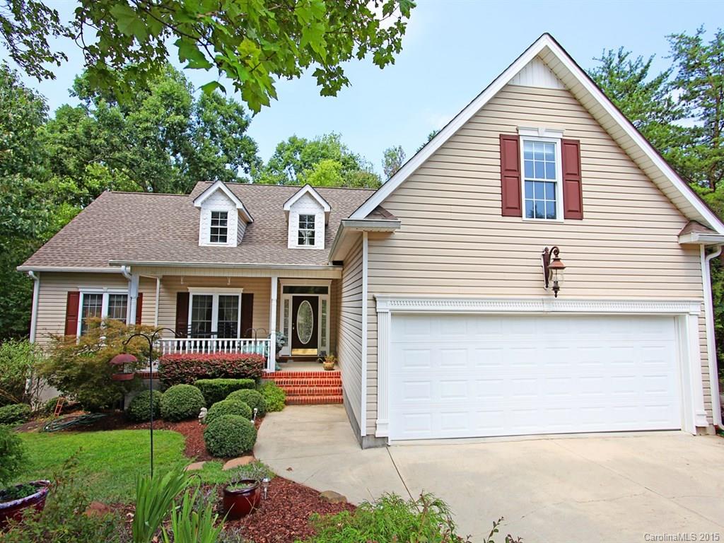 Hidden BEAUTY with Charming Front Porch & Large Back Deck Nestled on Quiet Cul-de-sac! Open & inviting RANCH with versatile upper Bonus Room for your needs. Vaulted Great Room with gas fireplace and skylights. Bayed Breakfast Area overlooking private wooded back yard. Split floor plan giving Elegant Master w/ tray ceiling, jetted tub & separate shower added privacy. Walk-in attic storage area plus pull-down area. Large Laundry Room w/cabinetry. Enjoy the active, lakeside life style of Tega Cay!