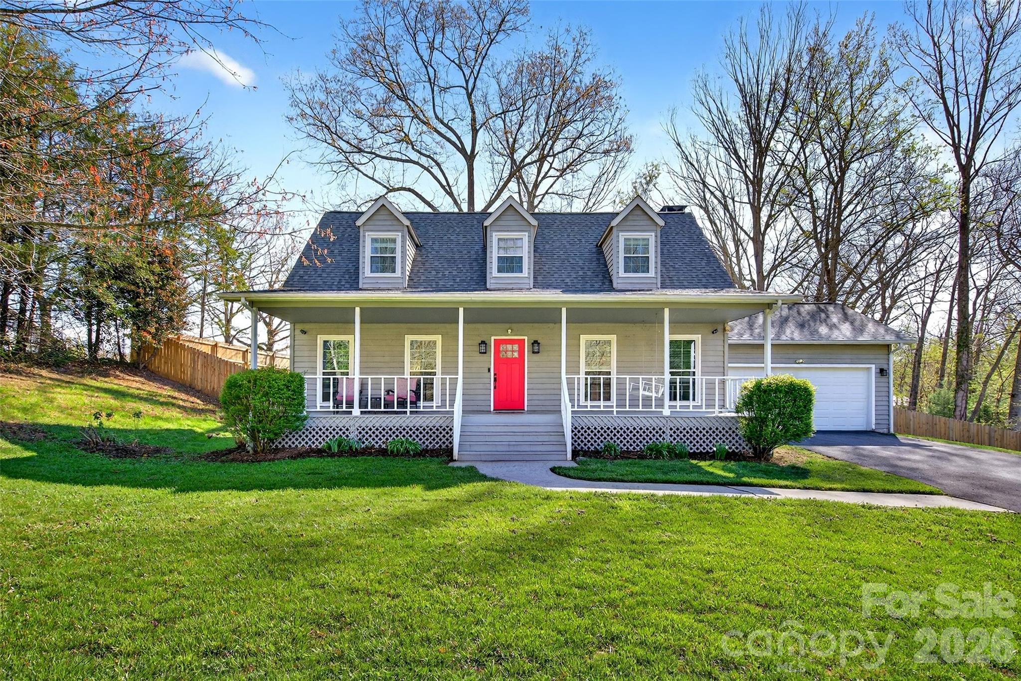 Tucked into a quiet neighborhood in desirable East Asheville, this beautifully maintained 3-bedroom, 2.5-bath home offers the perfect balance of comfort, location, and outdoor living. Situated on a spacious half-acre lot, you’ll enjoy both privacy and convenience—just a short drive to downtown Asheville and charming Black Mountain.

Inside, a warm and inviting layout features a cozy wood-burning fireplace, ideal for gathering on cooler mountain evenings. The home also includes a 2-car garage and thoughtfully designed living spaces that flow seamlessly for everyday living and entertaining.

Step outside to a gorgeous front porch, perfect for morning coffee, or unwind on the expansive back deck overlooking a fenced backyard—ideal for relaxing, hosting, or enjoying the outdoors.

Located just minutes from the Blue Ridge Parkway, you’ll have easy access to some of the region’s most stunning natural beauty, hiking, and scenic drives.

A wonderful opportunity in a prime location—this home is truly a must-see.