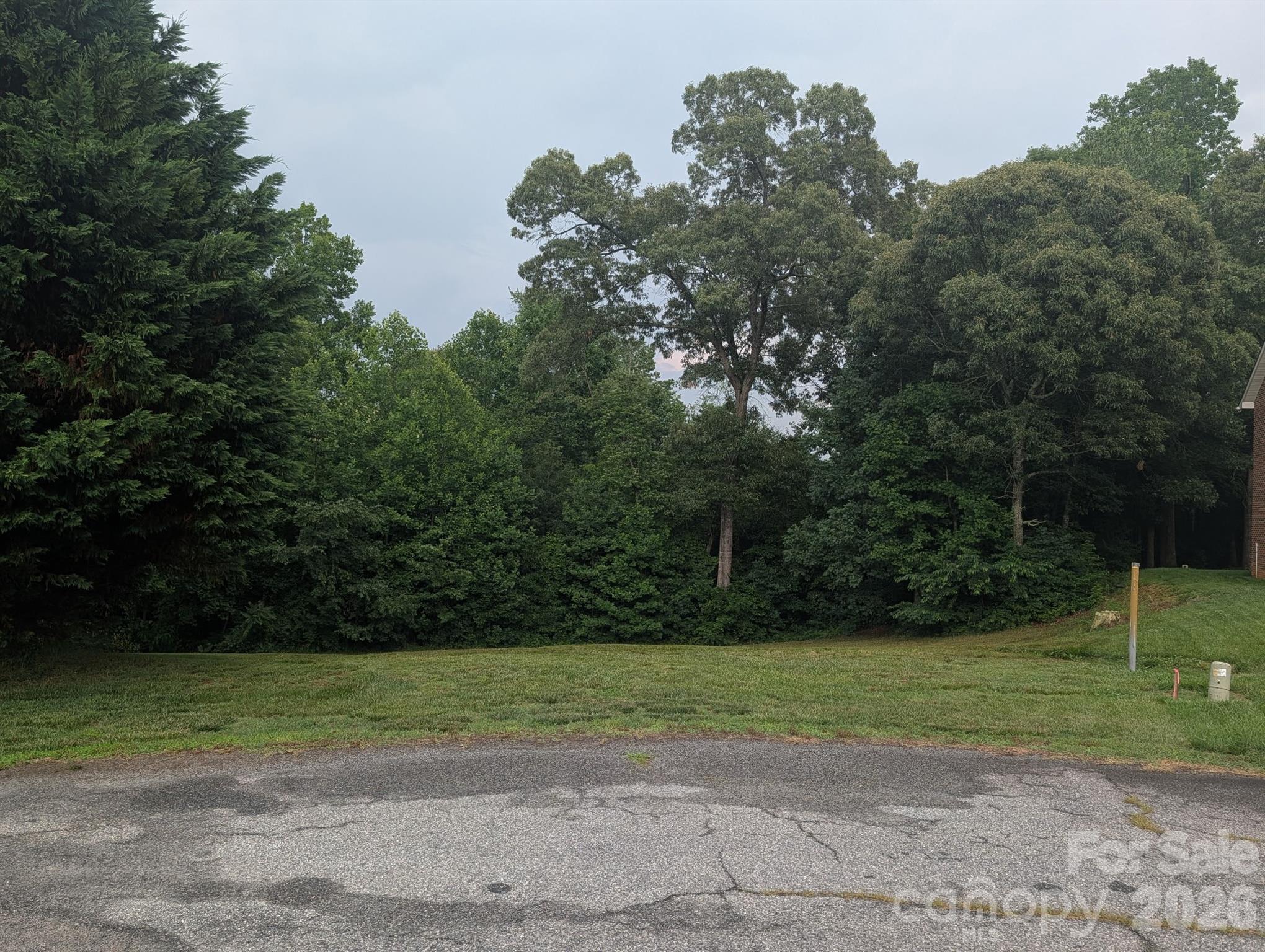 Beautiful lot conveniently located with easy access to nearby amenities. Ideal for a custom home with basement.
