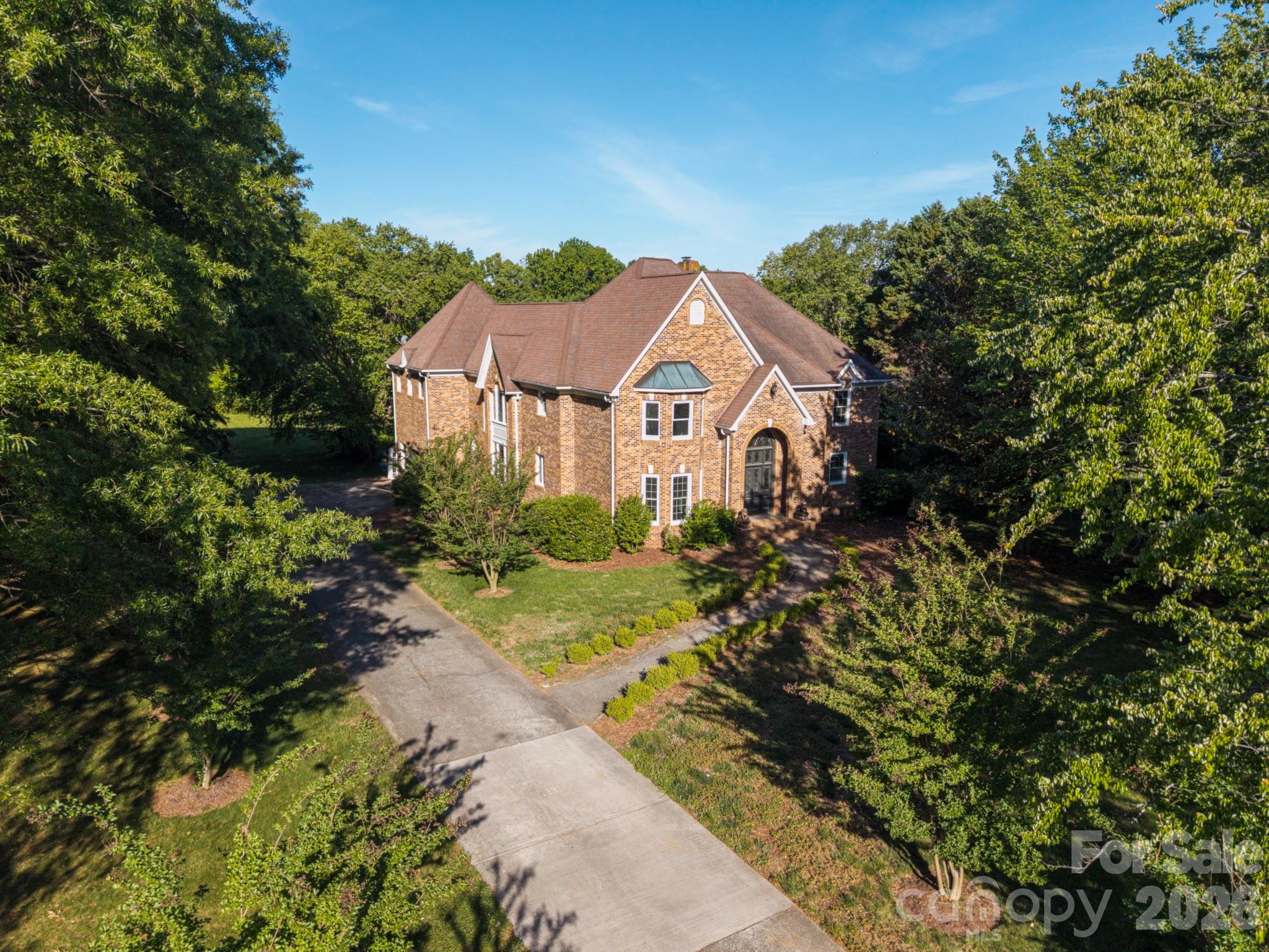 Location, Location, Location...Located in a Gated Community within the Top Rated Marvin School District.
This Full Brick Home that sits on 2.3 acres is a rare find w/ an Exceptional 0pportunity to transform this Rare Gem into your Dream Home! Primary suite on the main level, w/ 2nd Living quarters (Primary suite) on upper level, 2 laundry locations. Newly Renovated Kitchen w/ tons of cabinets, and counter tops, tons of natural light throughout the home. This Home offers a Formal Dining Room along with a breakfast area. This Open Concept flows into The Great room with a gas fireplace. This beautiful home offers multiple areas for entertaining and relaxing. This Full Brick Home offers incredible potential w/ a spacious interior and a large flat backyard complete with a pool/spa and mature trees boarding the property lines. With a some TLC and the right vision this home is will be Luxury Estate Living in the Walden at Providence.  WELCOME HOME!