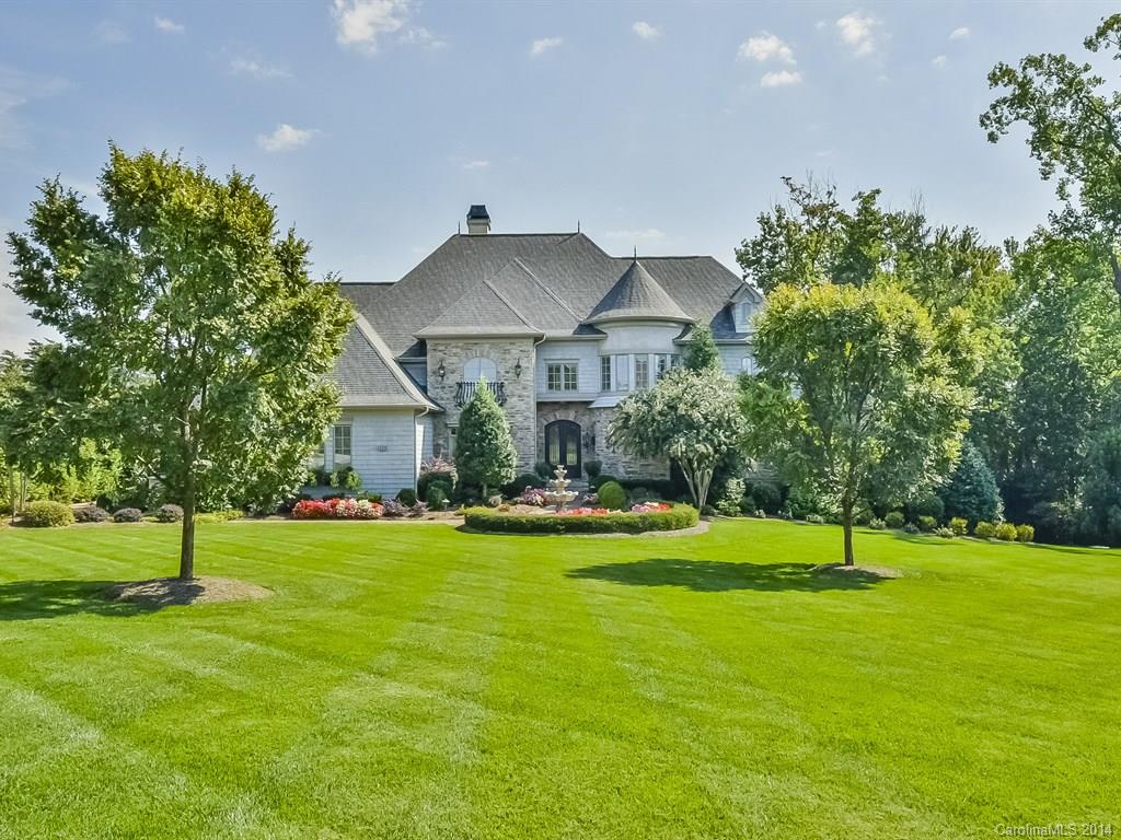 Spectacular Lake Norman Waterfront Home exudes elegance as it defines a warm & inviting atmosphere. It boasts over 9000 Sq Ft of livable luxury with handcrafted quality & design throughout. Newly renovated with impeccable style. Entertain your guest in the chef's dream kitchen which opens into a cozy hearth room. Enjoy the serene water views from your Screened Porch, Open terrace, covered Veranda or saltwater pool.Three Levels of Lake Living at its finest!