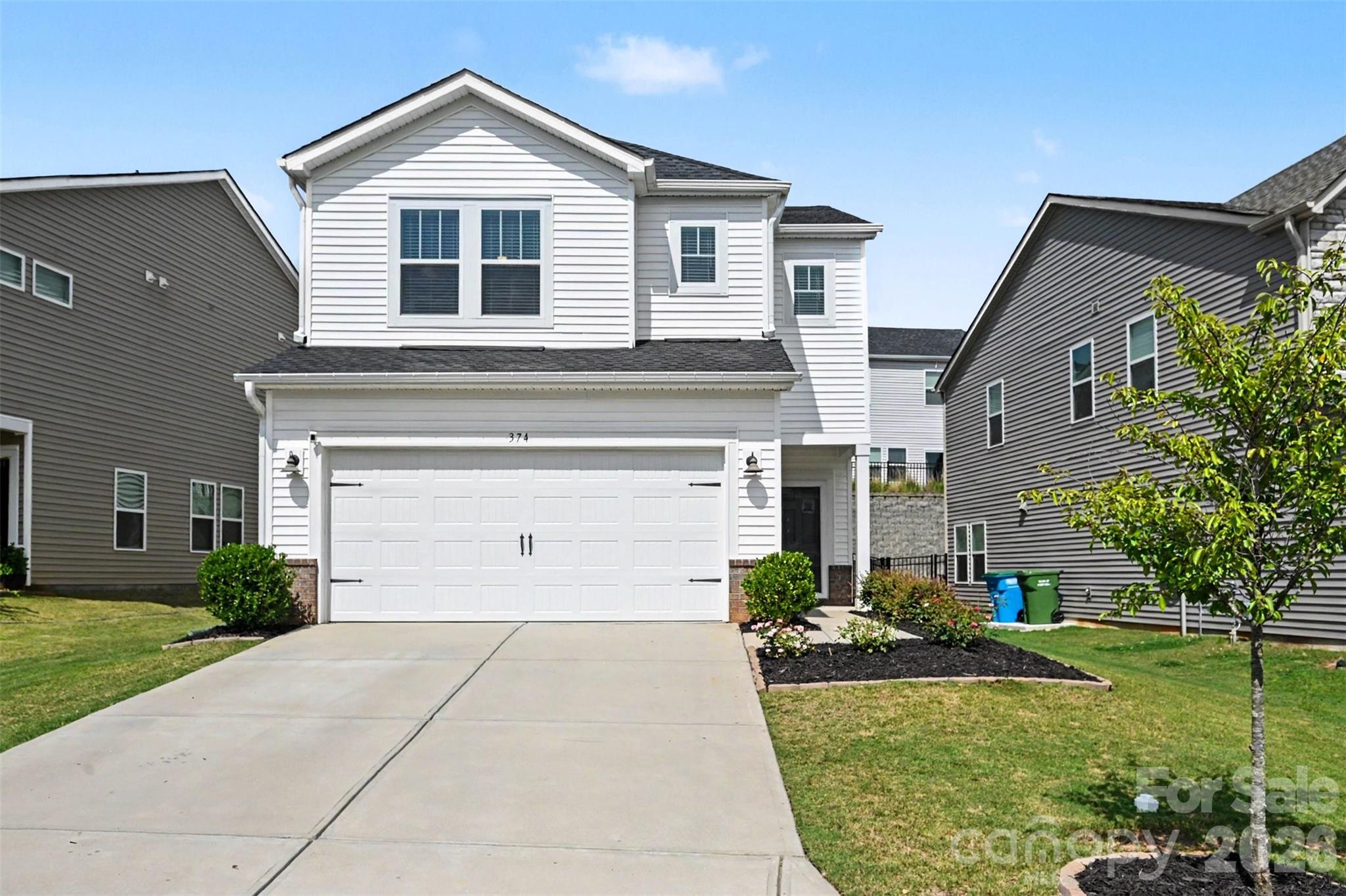 Fall in love with this like-new 2023-built home, where modern design, thoughtful upgrades, and an unbeatable Fort Mill location come together beautifully. This stunning 3-bedroom, 2.5-bath home showcases engineered hardwood flooring throughout the main level, modern upgraded lighting, and stylish finishes that create a warm, contemporary feel from the moment you walk in. The spacious kitchen is designed to impress with quartz countertops, a modern tile backsplash, stainless steel appliances, dual wall ovens, and abundant cabinet and counter space, making it perfect for everyday living and entertaining. Upstairs, the well-appointed bedrooms provide comfortable retreats, while the open floor plan offers both functionality and flexibility. Step outside to enjoy the expanded patio overlooking a private, fenced backyard, an ideal space for relaxing, grilling, or entertaining guests. Located in Fort Mill’s award-winning school district with quick access to I-77, this home is just minutes from the shopping, dining, and entertainment of Baxter Village and Kingsley. Offering the perfect blend of modern style, quality upgrades, and everyday convenience, this move-in ready home is one you won’t want to miss.