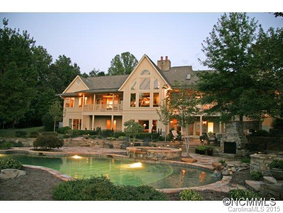 CAROLAND FARMS: Custom luxury home conveniently located in quiet, private setting w/spectacular mountain views on 12.51 ac. 4 bdrm suites,living rm,dining rm,large eat-in kitchen,family rm,recreation rm,5 covered porches,screened porch. Outside rock fireplace,custom designed saltwater/self-cleaning pool & rock hot tub. 12 miles of pristine NPA walking/horse trails. 12 min. to new Tryon Resort. Broker Owned. See attachments for property details.