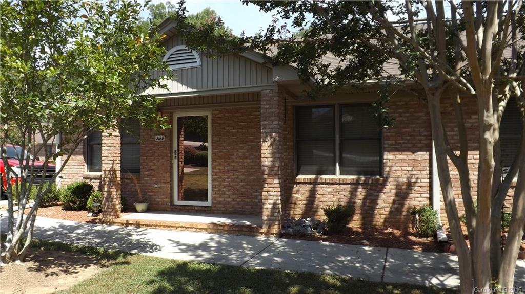 Move-in ready, 2BR/2BA brick condo. Living room has fireplace. Eat-in kitchen with appliances. Ideal location. Close to I-77, dining, shopping and all Rock Hill has to offer. This is an end unit home. Seller is paying for home warranty.