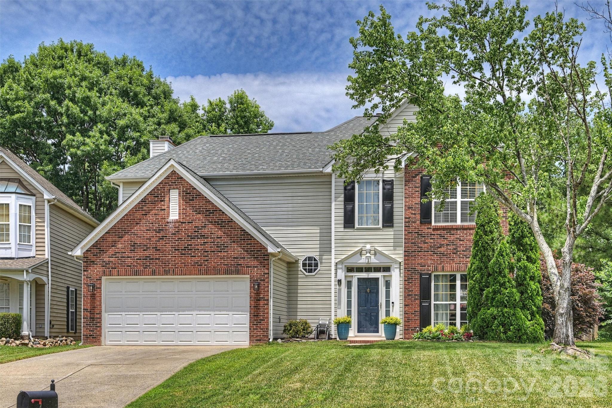 Welcome to 6311 Tunston Lane in the highly desirable, amenity-rich Highland Creek community! This beautifully maintained 4-bedroom, 2.5-bath home offers outstanding curb appeal, a fantastic lot, and a prime location adjacent to neighborhood greenspace for added privacy and enjoyment.Step inside to a welcoming two-story foyer and discover an open, thoughtfully designed floor plan. The main level offers a spacious kitchen with stainless steel appliances, along with versatile living and dining spaces that can easily adapt to your lifestyle, whether you're entertaining around the fireplace, working from home, or sitting down to a formal dinner with family and friends.Upstairs, you'll find four generously sized bedrooms and two full bathrooms, including a bright and airy primary suite highlighted by tray ceilings and abundant natural light. The en-suite bath features a dual vanity, soaking tub, and separate shower, creating a relaxing retreat at the end of the day.Outside, enjoy one of the home's standout features: a wonderful screened porch overlooking the flat, fully fenced backyard. With plenty of room for pets, play, gardening, or entertaining, this outdoor space is ideal for year-round enjoyment.Located in sought-after Highland Creek, residents enjoy access to resort-like neighborhood amenities with access to multiple swimming pools, tennis and pickleball courts, a fitness center, parks, playgrounds, walking trails, sports fields, fishing ponds, community events, and the renowned Highland Creek Golf Club. Along with conveniently located shopping and dining, and easy access to major highways. This move-in-ready home combines comfort, space, and an unbeatable location—don't miss your opportunity to make it yours!