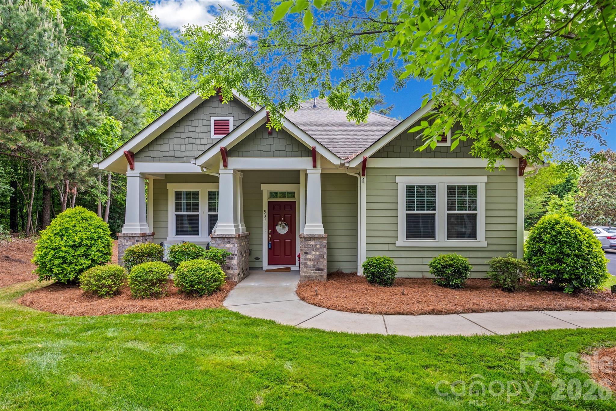 ***Seller is offering $10,000 towards buyer closing costs*** Tucked into a quiet, private pocket of Lake Wylie, this rare opportunity doesn’t come around often! Homes in this sought-after neighborhood are hard to snag, and this one stands out as the largest lot in the community. This charming ranch-style patio home offers effortless, easy living with an open layout perfect for gatherings. Real hardwood floors flow through the main living areas, adding warmth and character throughout. Step outside to your fenced-in backyard that backs up to peaceful woods and imagine your own private retreat for morning coffee or evening unwinding. Enjoy the convenience of being within walking distance to the grocery store and doctor’s office, while still feeling tucked away from it all. Located just minutes from the North Carolina border and Charlotte Douglas International Airport, this home combines tranquility with unbeatable accessibility. If you’ve been waiting for the right one in Lake Wylie this is it.