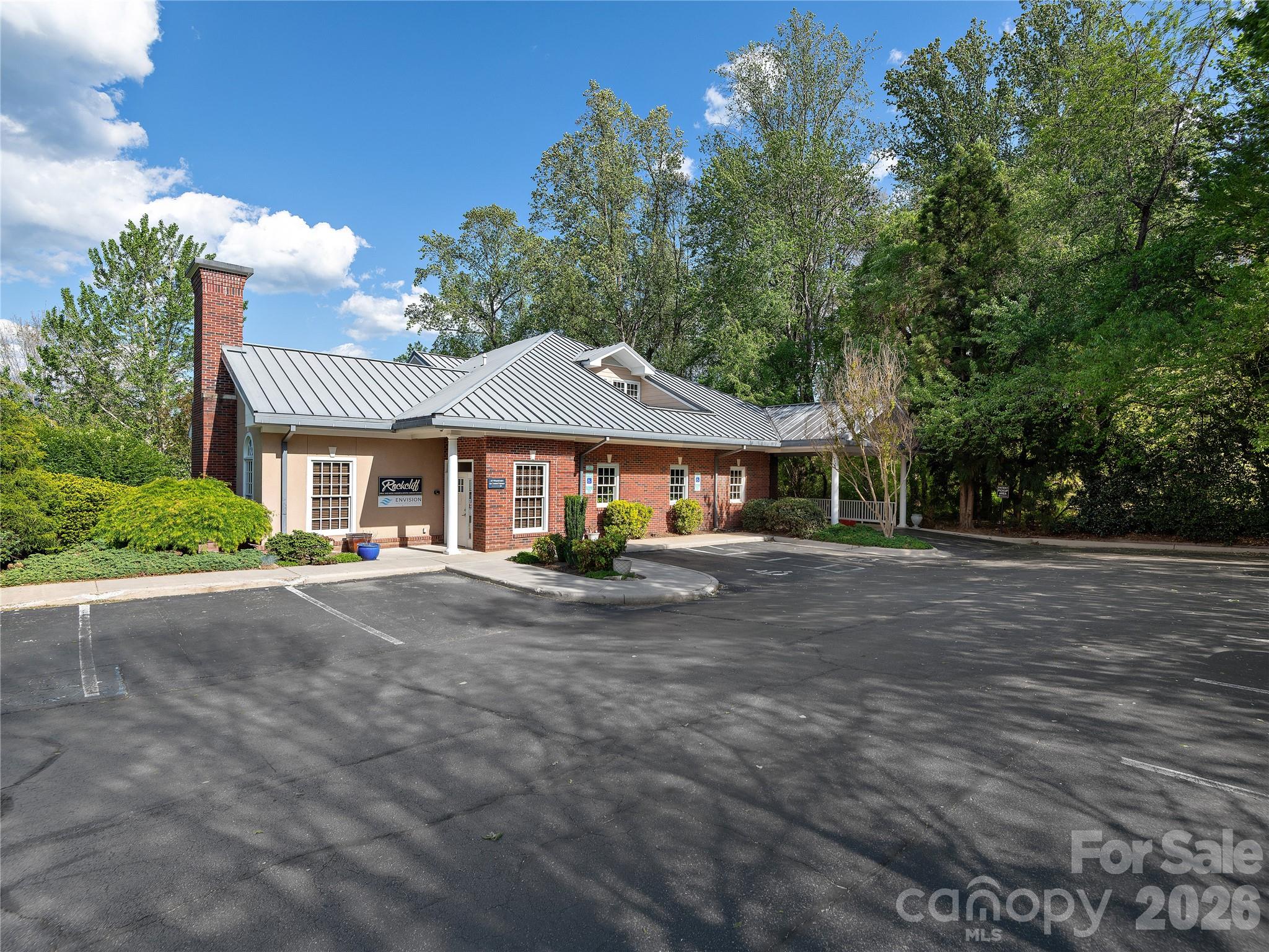 4 Medical Park Drive in Asheville, North Carolina represents a compelling investment opportunity within one of Western North Carolina’s most established and desirable medical parks. This well-maintained medical office building encompasses approximately 8,911 square feet of highly functional clinical and administrative space, situated on a 0.71-acre parcel.

Purpose-built for medical and dental use, the property is thoughtfully configured with dedicated exam rooms and a surgical suite, allowing for immediate occupancy by a wide range of healthcare providers. Originally constructed in 2000 for an owner-occupant, the facility has been consistently operated as an oral surgery practice, underscoring its suitability for specialized clinical use.

The site offers strong accessibility and parking capacity, featuring upper and lower parking areas with a total of 26 striped spaces, along with the potential to add additional parking if needed. Existing medical and dental infrastructure is in place, including a backup generator (currently not operational), providing a solid foundation for future upgrades or continued use.

Overall, 4 Medical Park Drive delivers a rare combination of location, functionality, and adaptability—positioning it as an attractive option for both investors and owner-users seeking a presence in Asheville’s thriving healthcare market.