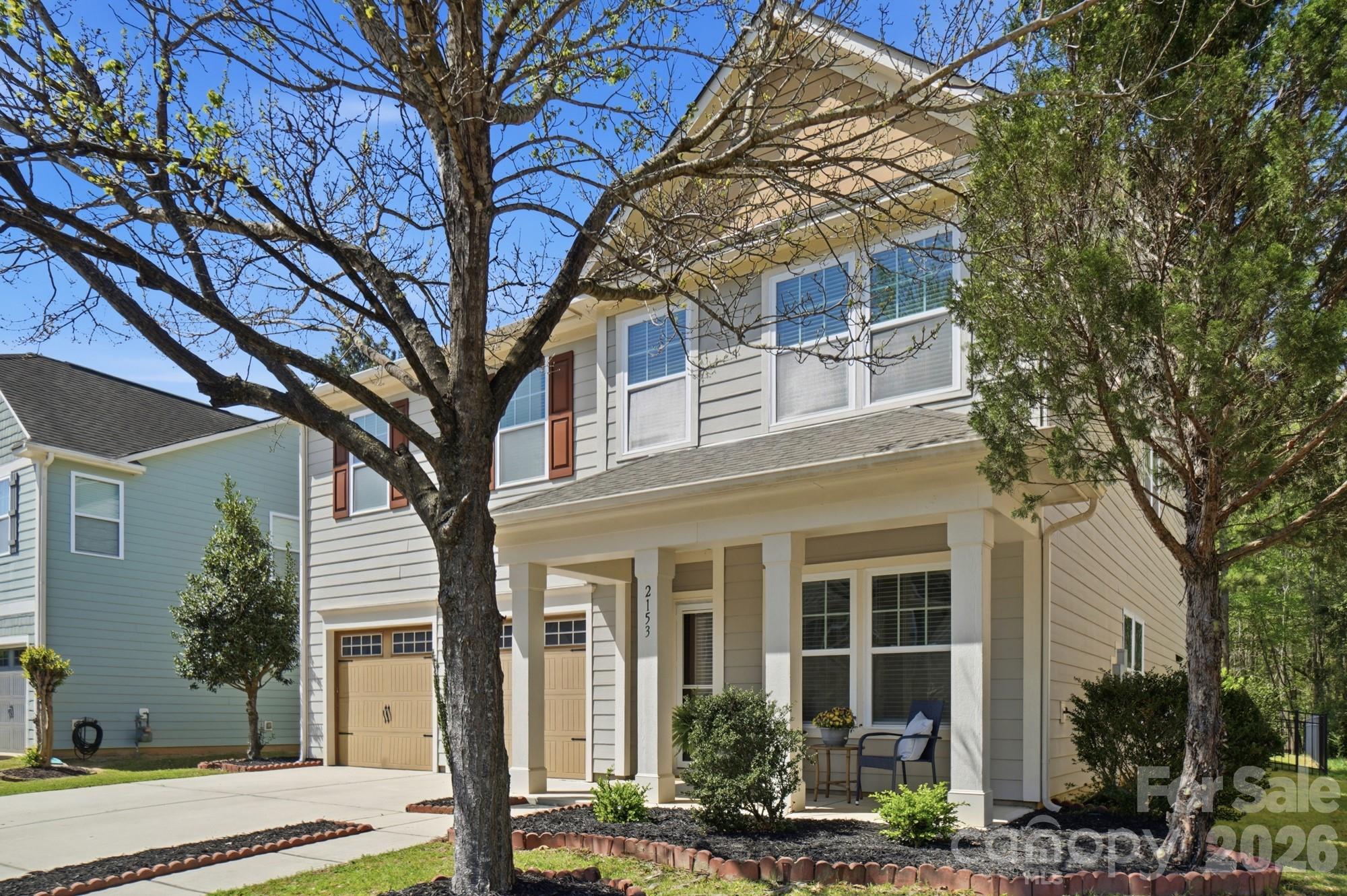 Don't miss your opportunity to move into this spacious and beautifully maintained, East facing, 4-bedroom, 2.5-bath home offering approximately 3,000 square feet of comfortable living space in the desirable Lake Ridge community of Tega Cay, SC. Designed with both functionality and style in mind, this home features an open and inviting floor plan perfect for everyday living and entertaining.The main living areas flow seamlessly, creating a bright and airy atmosphere with plenty of room to gather. Upstairs, you’ll find durable and stylish laminate flooring throughout, along with freshly installed carpet on the stairs for added comfort and a polished look.
The generously sized bedrooms provide flexibility for family, guests, or a home office setup, while the primary suite offers a private retreat with ample space to unwind. Step outside to enjoy the private, fully fenced backyard—ideal for pets, play, or relaxing evenings. The large patio provides the perfect setting for outdoor dining and entertaining, all while backing up to serene wooded views for added privacy and tranquility. Located in the amenity-rich Lake Ridge community, residents enjoy access to a variety of neighborhood features while being conveniently close to shopping, dining, and major commuting routes. This home truly offers the perfect blend of space, comfort, and location. Don’t miss the opportunity to make this exceptional property your next home!