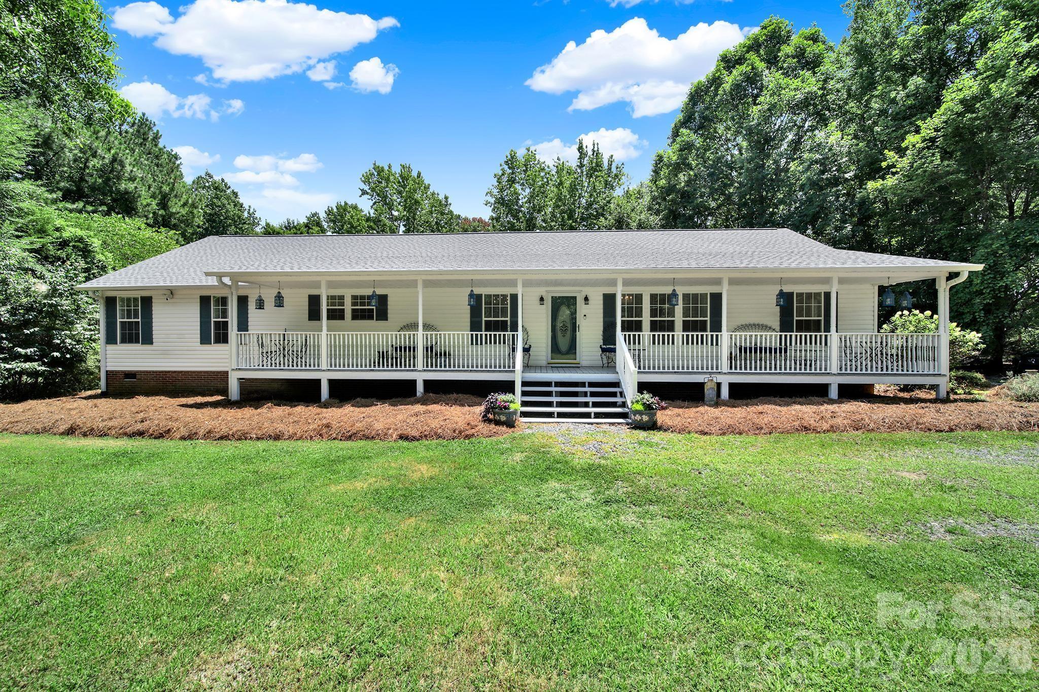 Enjoy peaceful country living with the convenience of nearby amenities in this 4-bedroom, 2-bath home situated on 1.88 private acres. Located near Lake Wylie, this property offers plenty of space for outdoor activities, gardening, or future improvements.

The home backs up to the prestigious The Palisades community, providing a serene wooded setting and added privacy. With generous acreage, a functional floor plan, and a desirable location close to shopping, dining, recreation, and lake access, this property presents a unique opportunity to enjoy the best of both rural and suburban living. The Palisades area is known for its proximity to Lake Wylie and its resort-style community amenities. 

Updates on New Roof 2024, Heat Pump/HVAC 2023, Septic was seviced 6-6-26.
