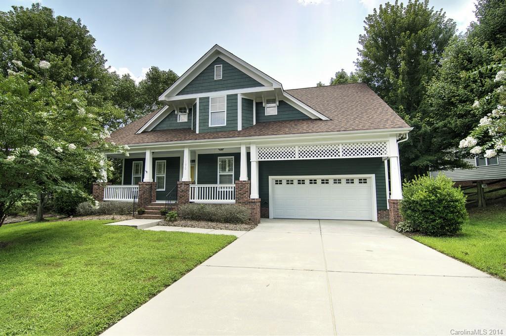 Gorgeous home with upgrades galore! Vaulted Foyer, Raised Ceilings on Main. Gourmet kitchen with granite, unique custom back splash, and spacious breakfast area. Master on Main with double sink, garden tub, and large walk-in closet. Large 4th Bedroom/Bonus Room may also be used as a rec room, media room, or play room. Screened-In Porch, Deck, Gorgeous new Custom Landscaping with fire pit in back. Within easy walking distance to the new Tega Cay Elementary School.