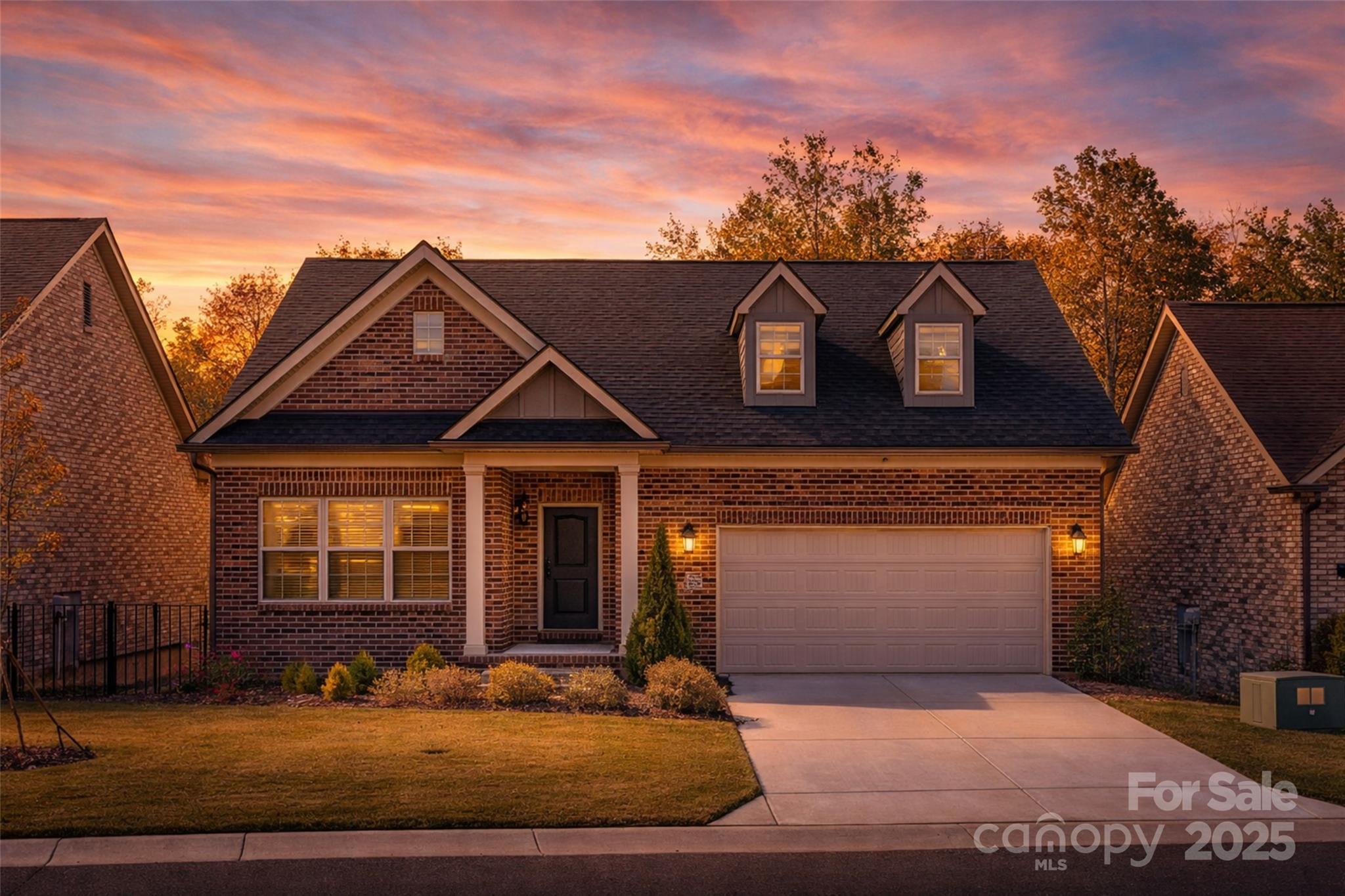 Experience refined living in this stunning all-brick home, perfectly nestled within a highly desirable gated 55+ community in Tega Cay. Designed for comfort and style, this 3-bedroom, 3-bath residence features open living spaces, soaring ceilings, and abundant natural light throughout. The chef’s kitchen impresses with granite countertops, premium stainless steel appliances, a gas cooktop, and an oversized island ideal for entertaining. The main-level primary suite offers a spa-inspired bath, walk-in closet and access to the outdoor living area. A finished basement adds a spacious recreation area, guest suite, and generous storage. Enjoy the convenience of laundry rooms on both levels. Relax or host gatherings on the expansive Trex deck overlooking beautifully maintained surroundings—all minutes from Lake Wylie, upscale dining, shopping, and major interstates.