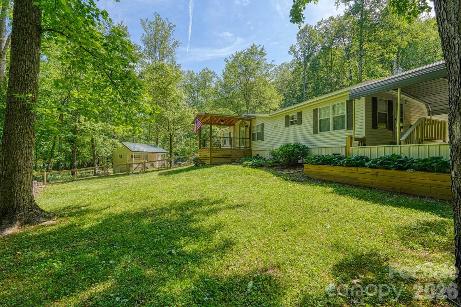 Discover this beautifully updated home situated on an acre of land, offering a rare blend of space, privacy, and functionality. Enjoy outdoor living at its best with a screened front porch and a new covered back porch overlooking a fenced backyard, mature trees, and a peaceful creek setting. The property also features a gazebo, garden shed, and an additional storage building, ideal for hobbies, workspace, or extra storage. Inside, the home showcases fresh interior paint, luxury vinyl plank flooring, and hardwood floors throughout. The living area includes a wood-burning fireplace, creating a warm and inviting atmosphere. The kitchen is designed for both everyday living and entertaining with ample counter space, a gas cooktop and oven, and a large pantry. All appliances convey with the home. Additional highlights include updated light fixtures, new blinds, spacious closets, and skylights that bring in natural light. The primary suite features a double vanity and a walk-in shower. A new HVAC system adds comfort and peace of mind.  Complete with a 12x10 garden shed and a 20x16 workshop with electricity and AC. This property offers a unique opportunity for those seeking space, outdoor features, and many update, all in one setting.
This is listed as a two bedroom because the septic is permitted for two bedrooms.  However there is one more bedroom available.