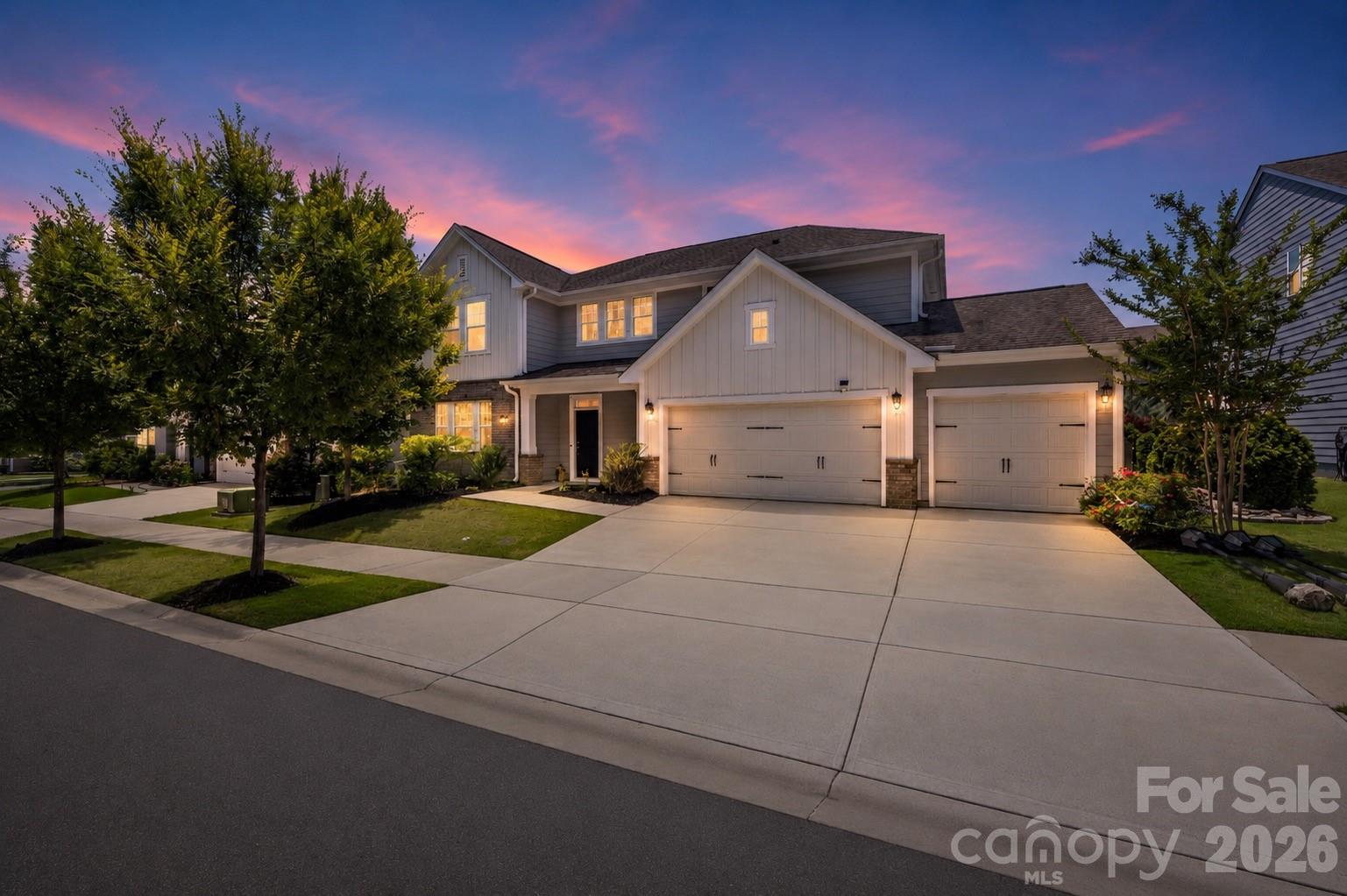 Tucked away in the desirable Massey community and situated across from a natural preserve, 1227 Thomas Knapp Parkway offers a peaceful setting with added privacy and a thoughtfully designed floor plan.

A welcoming front porch leads into an open-concept layout featuring a dedicated home office overlooking the backyard and pool, creating an inspiring work-from-home setting. The main level also includes a guest bedroom and full bath, providing flexibility for visitors or multigenerational living, while the spacious living areas are designed for both everyday comfort and entertaining.

Step outside to the expansive backyard featuring a built-in pool and covered patio, an ideal space to unwind, dine outdoors, or host gatherings with family and friends.

Upstairs, a spacious setback loft with blackout shades creates the perfect media room or private retreat. The primary suite offers a tray ceiling, dual-sink vanity, and generous walk-in closet. Thoughtfully designed for privacy, the layout places the primary suite in its own section of the home, with a secondary bedroom featuring an en-suite bath and two additional bedrooms situated in a separate wing with a shared bathroom.

As an added bonus, the home includes custom draperies, the mounted TVs in the family room and loft, the kitchen refrigerator, and the washer and dryer (making your move even easier).

Residents of Massey enjoy exceptional amenities including a resort-style pool with lazy river, water slide, lap lanes, clubhouse, fitness center, playgrounds, walking trails, and community gathering spaces. Known for its architectural variety and welcoming streetscape, Massey offers a neighborhood feel that stands apart.

Conveniently located near Highway 521 and Interstate 77, with shopping, restaurants, and a new Harris Teeter coming nearby, this home combines privacy, functionality, and convenience in one of Fort Mill's most desirable communities.
