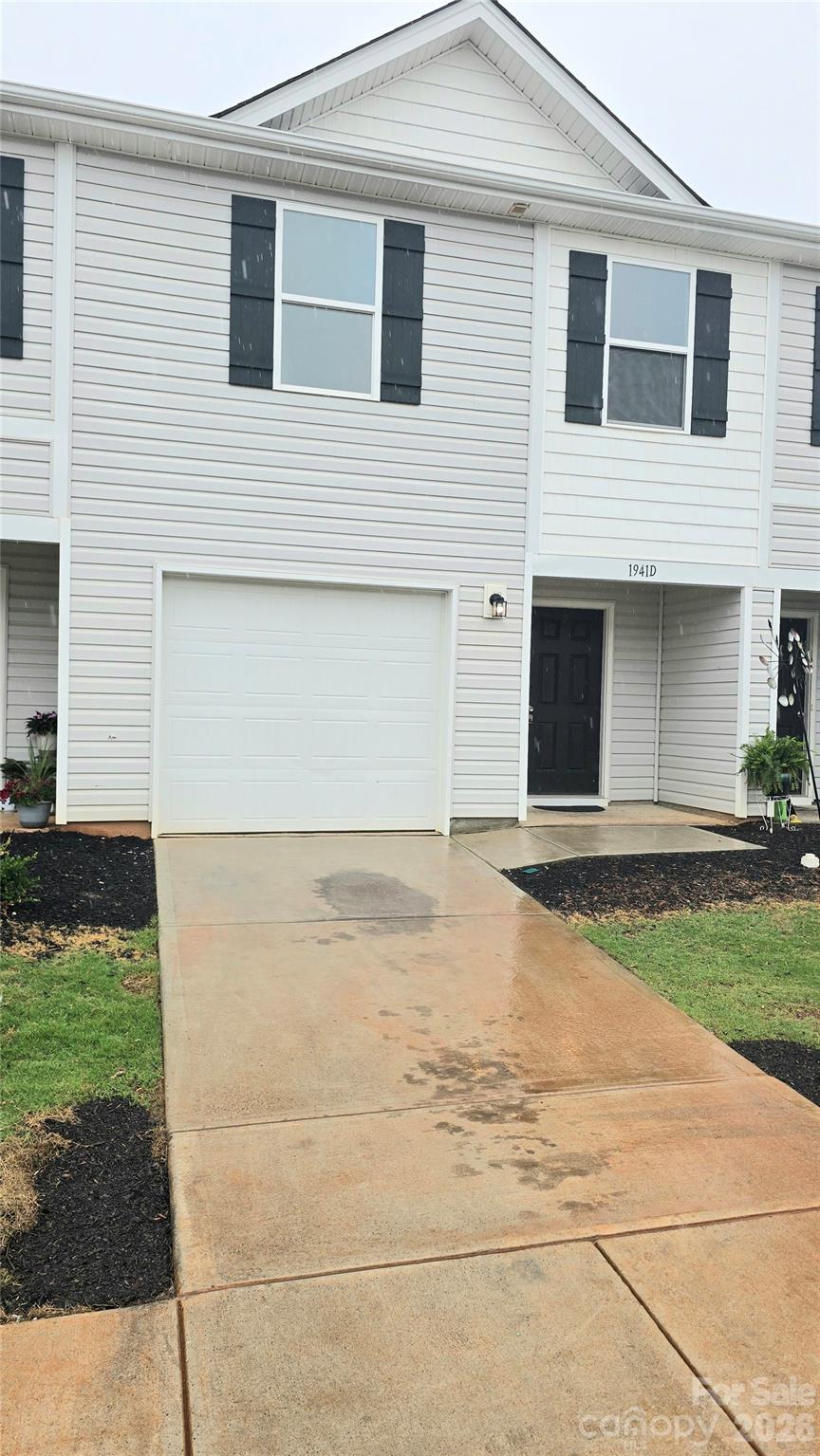 Welcome to the beautifully designed Holly Springs plan in the sought-after Trivium Townhomes community! This 2-story townhome features an open-concept layout with a spacious great room ideal for everyday living and entertaining. The kitchen is appointed with stylish cabinetry, granite countertops, and stainless steel appliances, including a smooth-top range, microwave, and dishwasher. Upstairs, you will find all bedrooms, including the primary suite, conveniently located along with the laundry room and a versatile loft space perfect for a home office, playroom, or additional living area. The spacious primary suite offers a private bath with dual vanities and a walk-in closet. Complete with a 1-car garage, this home combines comfort, functionality, and modern finishes throughout.
