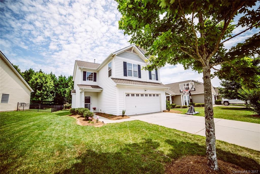Welcome to this move-in ready home in desirable Whitley Mills.Home has lots to offer!Hardwoods on main.New granite in kitchen w/brkfst bar & lrg eat-in area.Arched entry from kitchen opens to living rm with cozy gas log fireplace.Enjoy entertaining w/ friends on the back patio w/flat back yard.Spacious mstr suite has vaulted ceilings w/2 walk-in closets.Mstr bth includes a garden tub and separate shower.Other amenities include a community pool/clubhouse.Ft Mill schools, close to shopping & I-77.