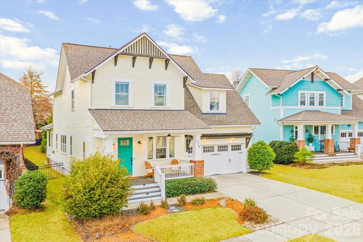 Walk your kids to top-ranked Kingstown Elementary (#4 in South Carolina) and live directly across from Harris Green — one of the most beloved gathering spaces in Masons Bend, known for daily play, community events, and neighborhood movie nights.

This is a rare opportunity to own a home that combines elite school access, expansive green space, and a truly walkable, connected lifestyle — all right outside your front door.

Welcome to 218 June Bug Lane in the highly sought-after Masons Bend community — where lifestyle, location, and community come together in a way that’s hard to replicate.

Perfectly positioned across from Harris Green, this home offers a unique outdoor experience that extends far beyond the property itself. From pickup soccer games and open play to community events and evening gatherings, this space becomes a natural extension of your everyday life — without the maintenance of a large private yard.

Even more compelling, you are just steps from highly acclaimed Kingstown Elementary — consistently ranked among the top elementary schools in South Carolina, with an A+ Niche rating, a 9/10 GreatSchools score, and a #4 statewide ranking. This is the kind of school access that drives long-term value and gives families confidence in their investment.

Inside, the home features an open-concept floor plan designed for modern living. The spacious kitchen includes granite countertops, stainless steel appliances, a large center island, and ample cabinetry — all flowing seamlessly into the dining and living areas, ideal for entertaining and everyday life. Natural light fills the home, creating a bright and inviting atmosphere throughout.

The primary suite offers a private retreat with a walk-in closet and en-suite bath featuring dual vanities and a walk-in shower. Secondary bedrooms provide flexible space for guests, a home office, playroom, or bonus room.

Step outside to a covered porch and backyard setting designed for relaxation and low-maintenance living, with a natural, private backdrop that enhances both privacy and ease of upkeep.

Masons Bend is also a golf cart-friendly community, allowing you to easily access Harris Green, visit neighbors, or take a quick ride to the resort-style pool and clubhouse.

Additional highlights include:
• Two-car garage
• Energy-efficient construction
• Move-in ready condition
• York County taxes

Masons Bend amenities include:
• Resort-style outdoor pool
• Clubhouse
• Miles of walking and biking trails
• Catawba River access and kayak launch
• Playground and multiple green spaces

If you’re looking for a home that offers walk-to-school convenience, direct access to Harris Green, and a lifestyle centered around community, connection, and outdoor living — 218 June Bug Lane stands out in a way few homes can.

Schedule your private showing today.