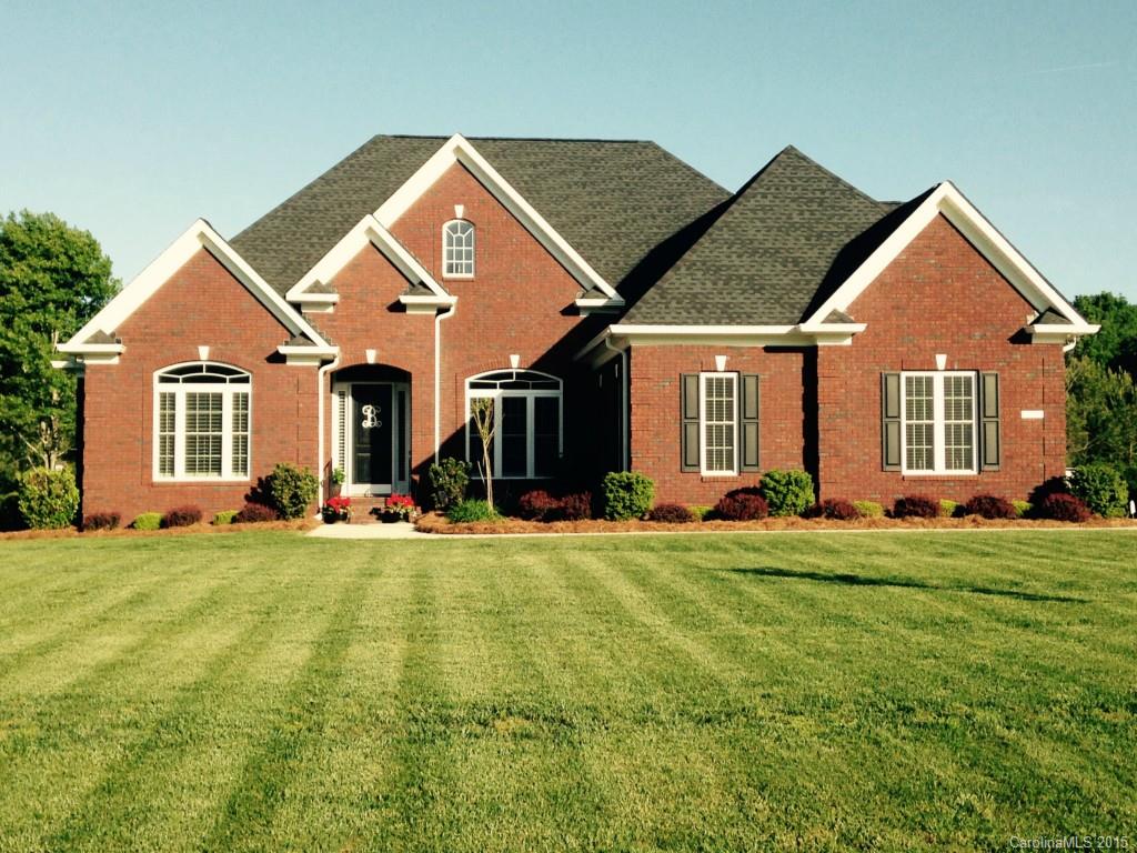 Beautiful, hard to find full brick ranch on an acre lot with gorgeous grass & landscaping! Custom home with gorgeous features including hardwoods, stone fireplace, amazing lighting fixtures, high ceilings, granite in kitchen & baths, tile backsplash, and custom plantation shutters throughout! Home is like new and immaculate. Owner had this house custom built! Very impressive!