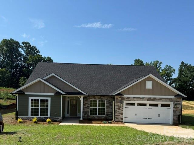 Only $1,000 down to write a contract! This brand-new construction home is situated on .98 acres in the new McNeely Farms subdivision in Mt. Ulla, NC. Conveniently located just minutes from downtown Mooresville, shopping, dining, and interstates 77 and 85.The 3,327 sq. ft. ranch with 4 bedrooms and an office and 3.5 bathrooms offers, 3 bedrooms, a flex space/office and 2.5 baths on the main level. The second floor includes a large bonus room, full bath, and a bedroom. The open-concept floor plan is designed for functionality and entertaining. Interior features include 9' ceilings, a spacious eat-in kitchen with oversized island, quartz countertops, tiled backsplash, gourmet stainless steel appliance package, and laminate wood flooring in the main living areas. The primary suite includes a 5' tiled shower. Exterior features include a 16’ x 14’ covered patio overlooking a large, level backyard in a peaceful setting, Hardie board siding and upgraded stone package. No HOA fees!  Closing cost paid (except prepaids and points) with use of preferred lender.  Flex cash available to lower interest rate!!
All photos are for representation purposes only