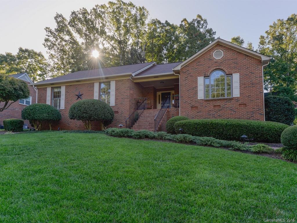 Exquisite updated full brick ranch in premier location w/brick 3car carport. Home glows at night w/custom outdoor lighting, Enjoy the fountain, lush private landscaping, patio & fenced yard. Big eat-in kitchen with newer appliances & granite counters, tons of cabinets, formal dining,separate laundry room, huge great room w/skylights, a lovely kingsize master suite+bath w/granite and frameless door shower. queen size secondary bedrooms,new carpet, paint,air conditioner,whole house air filtration