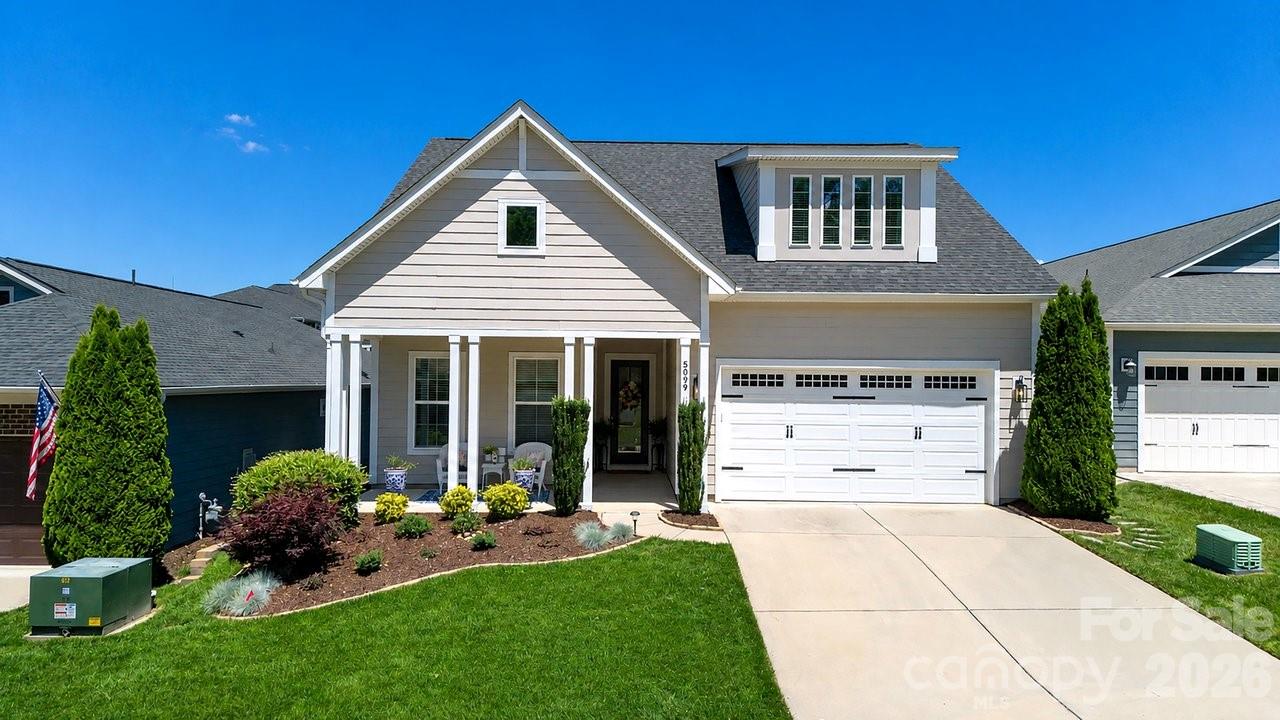Make yourself comfortable and enjoy the open concept Graham loft floorplan (exterior painted 2026) with crown & custom accent molding, 10' ceilings & 8' interior doors that has an amazing use of function and space. Well appointed kitchen anchors the main living area & includes SS GE Cafe gas appliances, quartz countertops, tile backsplash, task lighting and pull out shelves for easy storage access. Office flex space offers French doors for privacy. Great room features a custom linear electric fireplace and flows in to the sunroom. The adjacent dining area with triple glass sliding doors opens to a 3 season room "Eze-Breeze" with gas fireplace and on to the paver patio extending in and outdoor entertaining areas. Mature landscape enhances the rear yards private courtyard feel. A serene master suite with extra-large windows that fill the room with abundant natural light accesses the  the adjoining bath with dual sink vanity, tile floor in the bath with a generous walk-in closet and tiled shower. Luxury vinyl and tile floors throughout the main living areas. Second level features dual wide open living spaces, excellent walk in storage and additional guest suite with full bath. Attached 2 car garage includes the optional 4-foot extension perfect for golf carts or additional storage. Trilogy Membership includes Freedom Boat Club on Lake Norman plus award winning amenities.