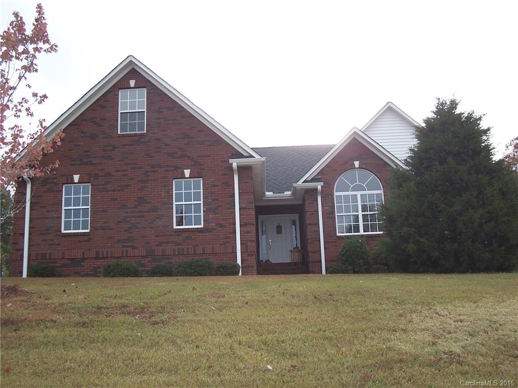 Cozy 3 bed 2 bath Ranch with high ceilings & vaulted great room. Finished garage with industrial coated floor. Many news: paint throughout entire home, stain on deck, garage door springs, plastic vapor in crawl space. Add steps and finish the unfinished FROG for a great loft! (est. 400 sq ft). Kitchen has upgraded cabinets and granite counter tops with a breakfast bar. Master bath includes garden tub, double sinks and walk in closets. Very private & beautifully landscaped yard on 1.3 acres.