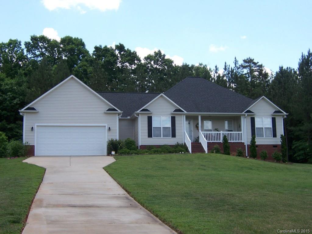 Enjoy your quiet evenings on the front or back porch.  You will fill like you are in the country but only 5 minutes from the interstate and 15 minutes from shopping.  When you walk in the front door you will feel right at home in this immaculate home.  Large master bedroom with trey ceiling and walk-in closet.  Master bath has separate shower and soaking tub. Kitchen has granite countertops.