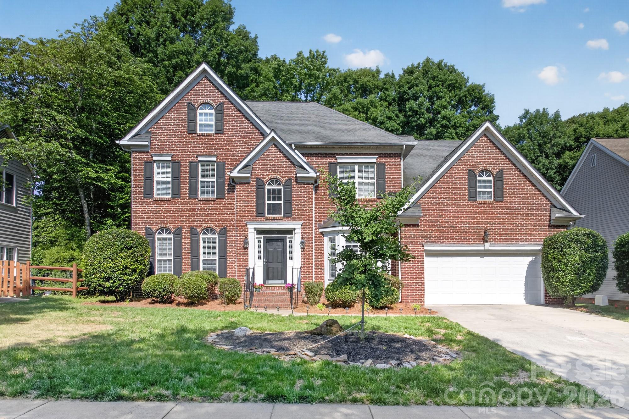 Kingston Forest...A unique neighborhood made up of only 4 cul-de-sac roads. Beautiful community. Close to the Morrison YMCA, The Bowl, Stonecrest shopping center & restaurants, and a highly sought-after school district. Just the perfect location for your new home. The property is over 3200 square feet. 4 bedrooms on the upper level with 2 full baths. 1 half bath conveniently located on the main floor. Spacious bonus room with a second staircase leading to the kitchen. Laundry also located on the main level close to garage entrance. A bright white kitchen is open to the den area. A large built in desk is located in the kitchen as well. Gas log fireplace in the den makes this area especially cozy during the cool months. An expansive back deck overlooks the private backyard and a paver walkway leading to a fire pit installed in 2015. Irrigation system for the entire yard. Pre finished hardwood floors run throughout the house, main & upper levels. No carpet! They were installed in 2016. The roof is approximately 10 years old. Outdoor keypad makes entering the garage much easier. New HVAC system installed in 2016. New hot water heater in 2017. New pine needles laid and the deck has been pressured washed just in time to enjoy the summer months. Plenty of storage for decorations. Great community, wonderful location, sought after school district....Everything you are hoping to find in a new home. Come see for yourself!