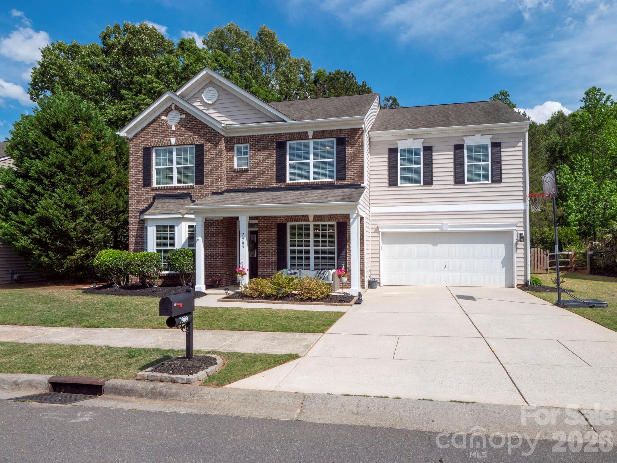 Welcome to this beautiful, Move-in ready 4-bedroom, 3-bathroom home in desirable Prescot neighborhood. This home features fresh paint and newly installed Luxury Vinyl Plank flooring downstairs. The spacious primary suite includes a large walk-in closet, while the en-suite bathroom offers dual vanities, a garden tub and a separate shower. The secondary bedrooms are generously sized and also include walk-in closets. A large bonus room with its own walk-in closet provides flexible space and could easily be converted into a fifth bedroom if desired. Relax with a cup of coffee on the charming rocking chair front porch, or unwind on the back patio overlooking the fully fenced tree-lined backyard. Complete with storage shed and raised garden beds, the outdoor space offers both privacy and functionality. Community amenities include walking trails, tennis courts, a soccer field, clubhouse, pool and playground. Conveniently located near shopping, restaurants and downtown Waxhaw.