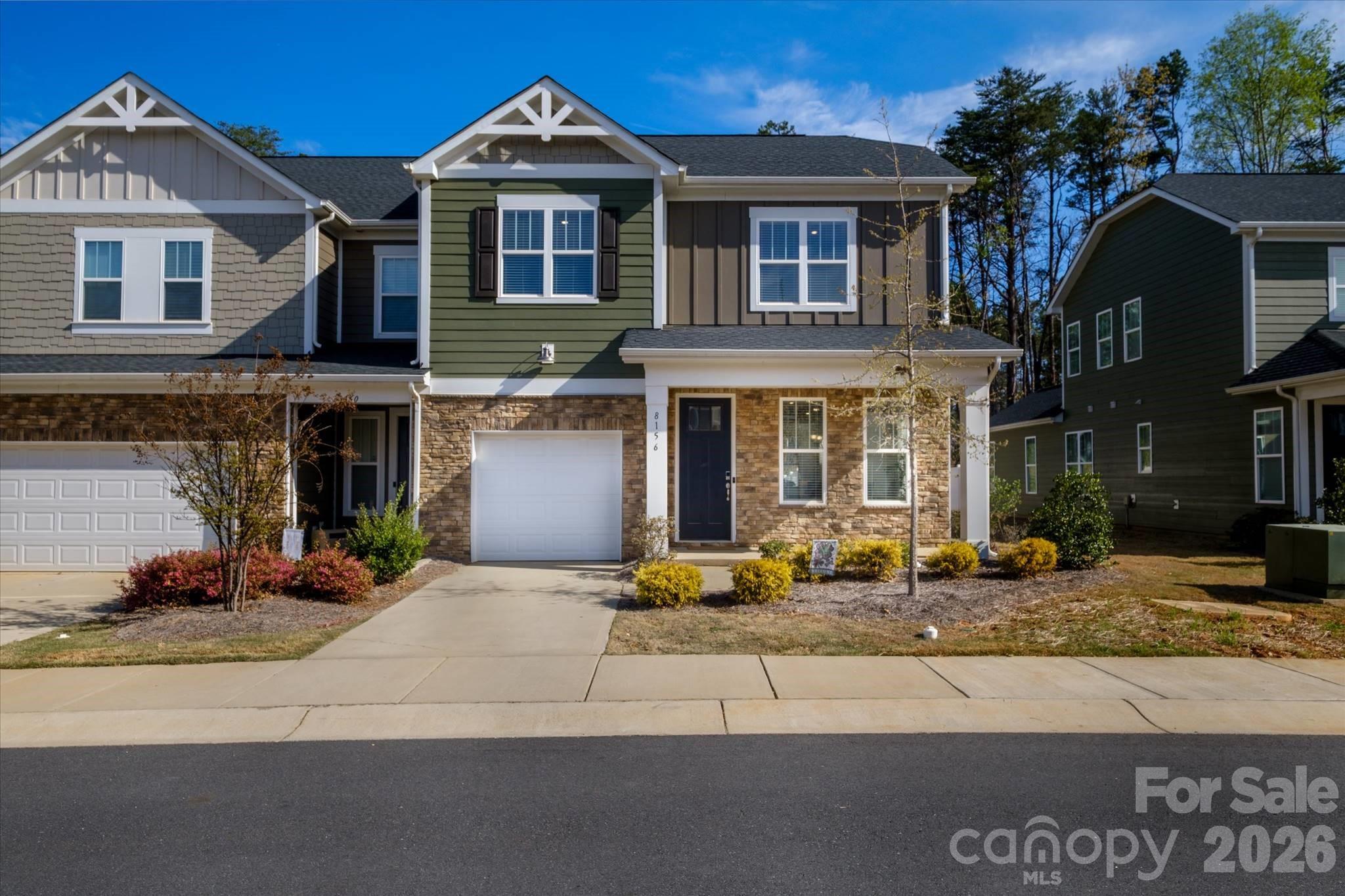 Stunning end-unit townhome, nestled in the resort-style community of The Redwood Rookery at the Vineyards. This community is conveniently located just 10 miles from uptown Charlotte and 4 miles from downtown Belmont. This location offers easy access to a ton of entertainment and dining options. Upon entering, you’ll be greeted by an open floor plan that floods the space with natural light. Backyard has a private fenced-in backyard. The kitchen is a chef’s dream, featuring a large kitchen island with quarts countertops and stainless-steel appliances. The primary bedroom on the main level and a spacious ensuite that features a large walk-in closet, dual vanities and a tiled standing shower. Upstairs, there’s a loft, two more bedrooms, and another full bathroom. This home offers everything you need for a comfortable and luxurious lifestyle.
With over ten miles of picturesque walking trails that wind through open green spaces along the waterfront of Lake Wylie, the community offers an array of extensive amenities that include 2 pools with one being a junior olympic-sized pool, 2 dog parks, playground, kayak launch dock, private boat ramp and sports complex featuring tennis, pickle-ball and bocce ball.