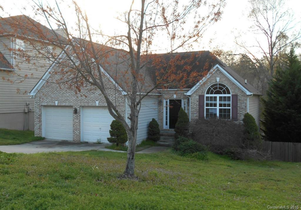 Just a few blocks from the community day dock and long Cove Marina for your boat storage !  A seasonal view of the water from your back deck. High ceilings, palladium and transom windows and heavy moldings. Brick front and brick fireplace in family room. Master bedroom has a trey ceiling and a soaking tub in master bath with separate shower. master is on main level, Two bedrooms and a bonus room on lower level. The back yard is fenced with a patio and also has a back deck on upper level.