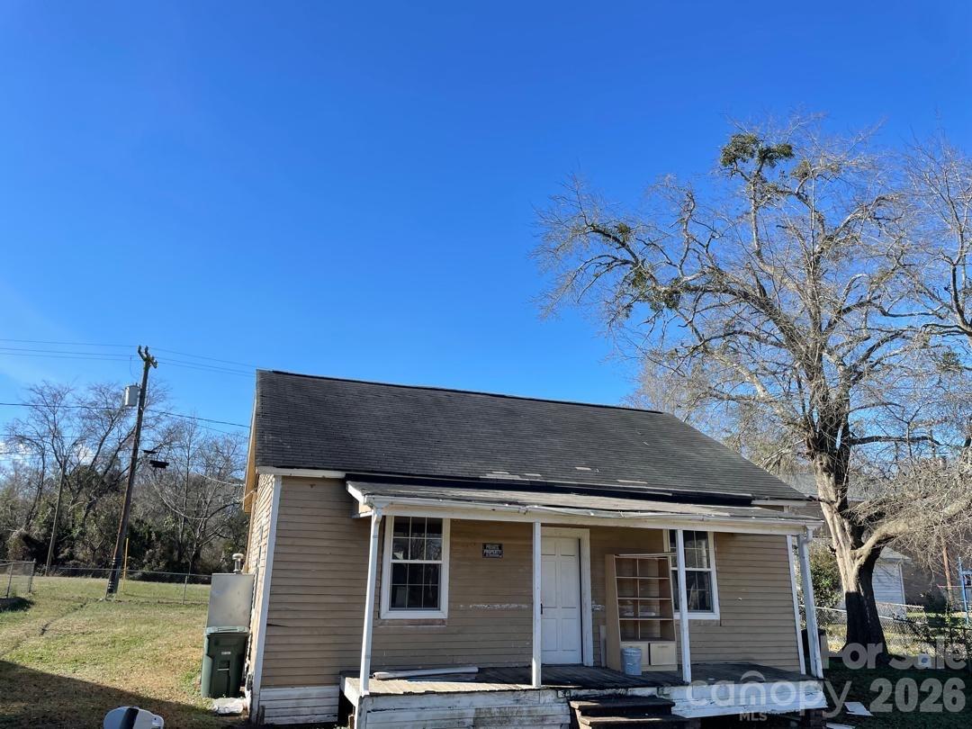 Investors/ Fixer Upper Special... This home is being sold as is. Buyer started to fix this home up and have some materials to go with it. The windows have been replaced. The floors have been started and there is extra flooring to continue with it. The bathroom sink and toilet has been updated. There are supplies for the bathroom already bought and will be left in the home as well. This is a good investor project as a lot of the materials are bought and just need to be installed. The heating and/or AC unit has never worked since the sellers have owned it.