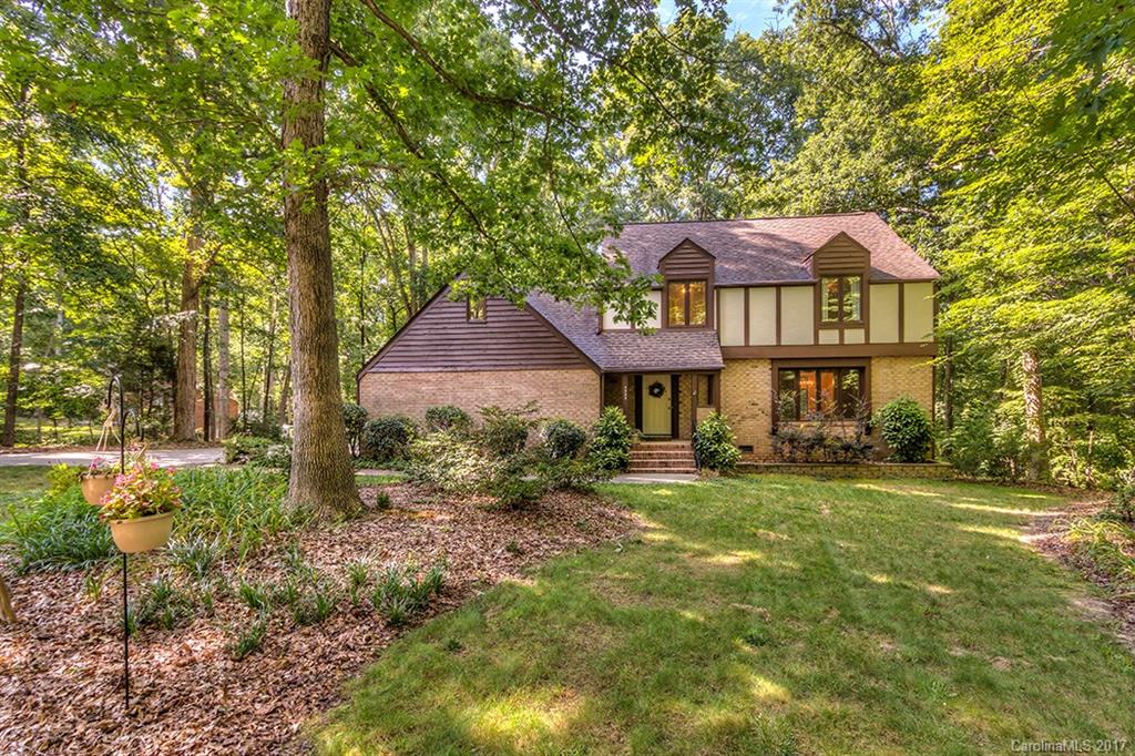 Don't miss this meticulously maintained Tudor style home in the highly desirable neighborhood of Wood Forest. Numerous updates to include quartz counters, updated master suite, fresh paint throughout, new carpet and the list goes on! Enjoy morning coffee on the screened porch with retreat like setting on nearly .79 wooded acres. Excellent schools, close to shops and restaurants. Purchase with confidence, move right in and enjoy all this spectacular home has to offer.