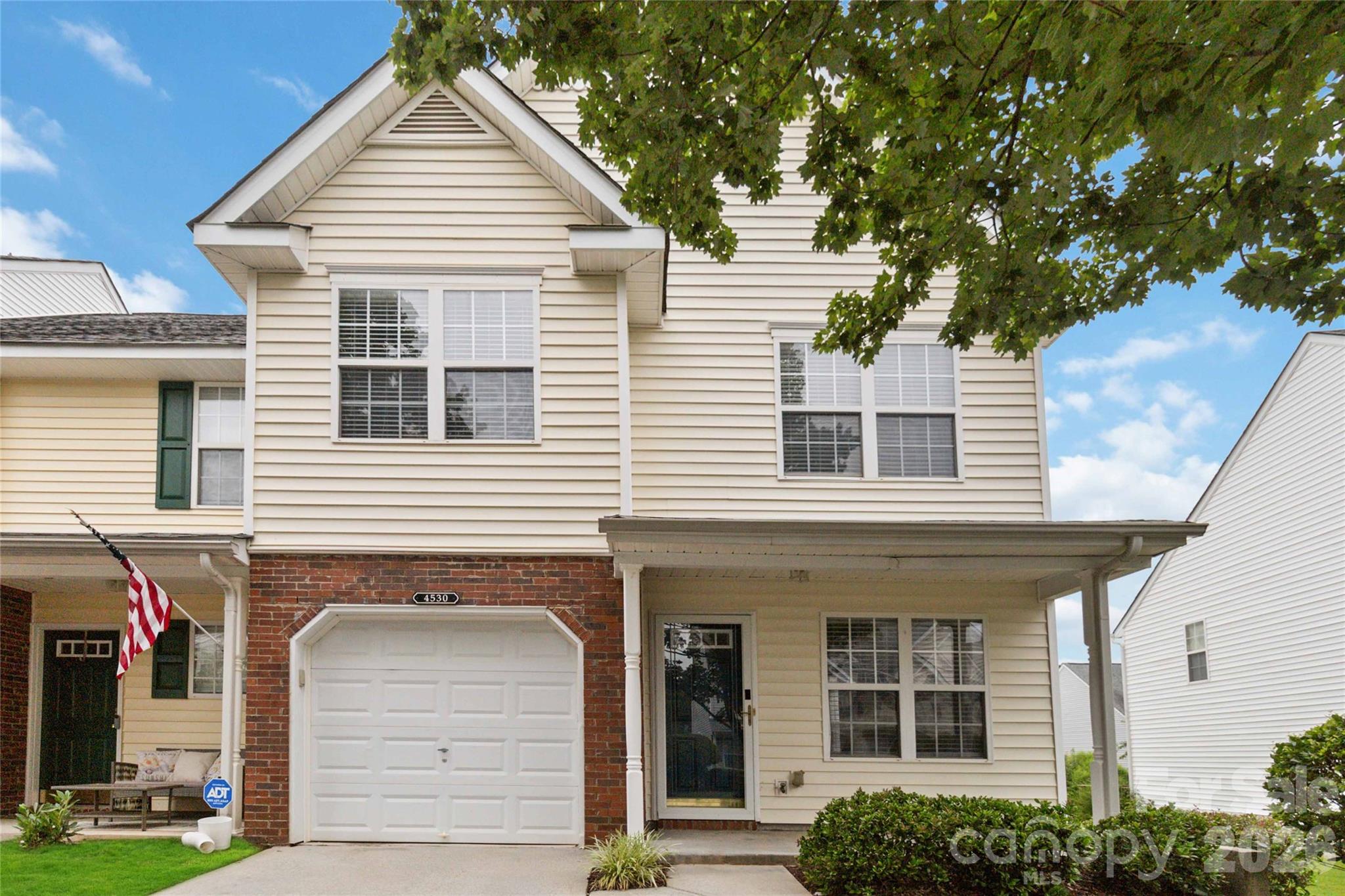 Move In Ready End Unit in Popular Hanover Community. Bright & Sunny Spacious Floor Plan Features/Wide Plank Wood Flooring through out Majority of Main Floor.  Entry through the Front Door into the Great Rm which Seamlessly Flows into the Dining Area and Kitchen.  Plenty of Counter Space & Pantry in the Kitchen.  2 Story Den w/Gas Fireplace could easily Function as a Home Office or Flex Space.  Primary Suite on the Second Level w/Cathedral Ceiling & En Suite Bath Boasting of a Large Garden Tub & Dual Vanity. Large Walk In Closet. 1 Car Garage, Deck & Plenty of Storage Space Under Stairs. HVAC Replaced in 2025. Quiet Community with Plenty of Amenities including Pool, Walking Trails, and a Play Ground. Enjoy all Indian Land has to offer w/the home being with in Minutes of Shopping, Dining & Schools. Easy Access to Ballantyne & I -485.