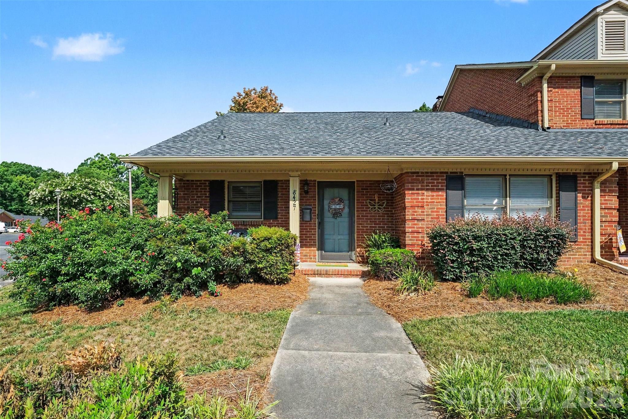 Hard-to-find, one-level full brick townhome in the highly desirable Coulwood Oaks community! This beautifully updated 2-bedroom, 2-bath home offers effortless, low-maintenance living with brand-new LVP flooring and plantation shutters throughout. Enjoy peaceful mornings on the charming covered front porch or entertain and relax in the private fenced patio, perfect for grilling, gardening, or pets. Ideally located just steps from Coulwood Park and only minutes to I-485, Hwy 16, the U.S. National Whitewater Center, Charlotte Douglas International Airport, shopping, dining, and everything Charlotte has to offer. Opportunities like this don't come along often. Schedule your showing before it's gone!