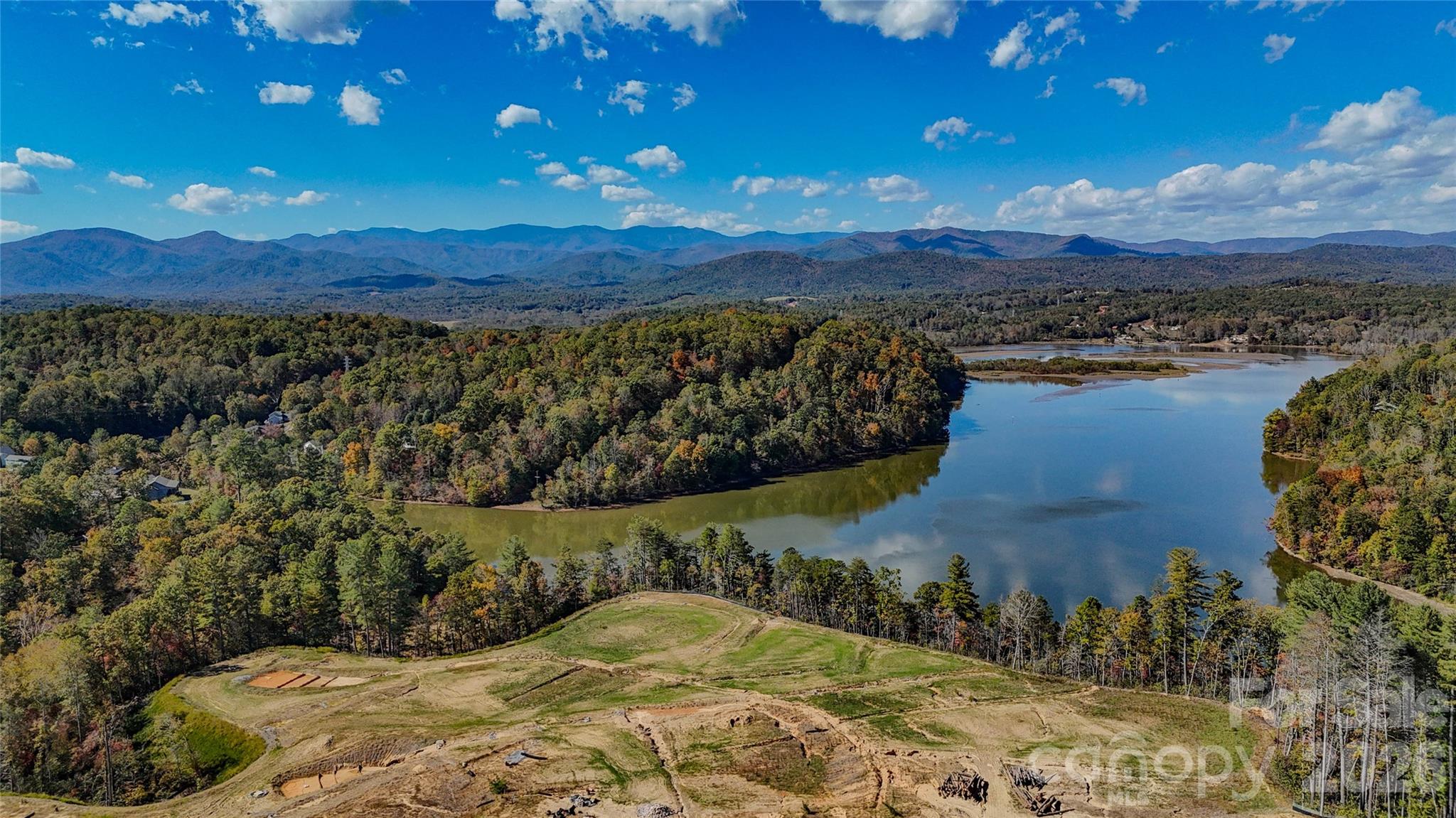 Looking for an RV site to enjoy Lake James? Discover Lot 133, a highly desirable deeded lot in The Reserve at Barefoot Landing on Lake James, offering beautiful long-range water and mountain views in a premier recreational community. Set within a thoughtfully planned 34± acre gated development with over 2,800 feet of pristine shoreline, this property provides an exceptional setting for a private lake retreat.  Lot 133 is part of an exclusive 142-lot community designed for both enjoyment and long-term value. Owners benefit from access to amenities at the sister community, Barefoot Landing on Lake James, including an outdoor pool, bathhouse, and laundry facilities. Future enhancements include a planned 113-slip marina, reviewed and approved by Duke Energy and the Federal Energy Regulatory Commission (FERC), in accordance with Duke Energy’s Shoreline Management Plan.  Ideal for a lake cottage or RV use, Lot 133 combines scenic beauty, resort-style amenities, and a rare ownership opportunity on Lake James. Secure your place in this sought-after lakeside destination and start enjoying the mountain and water views you’ve been dreaming of.
