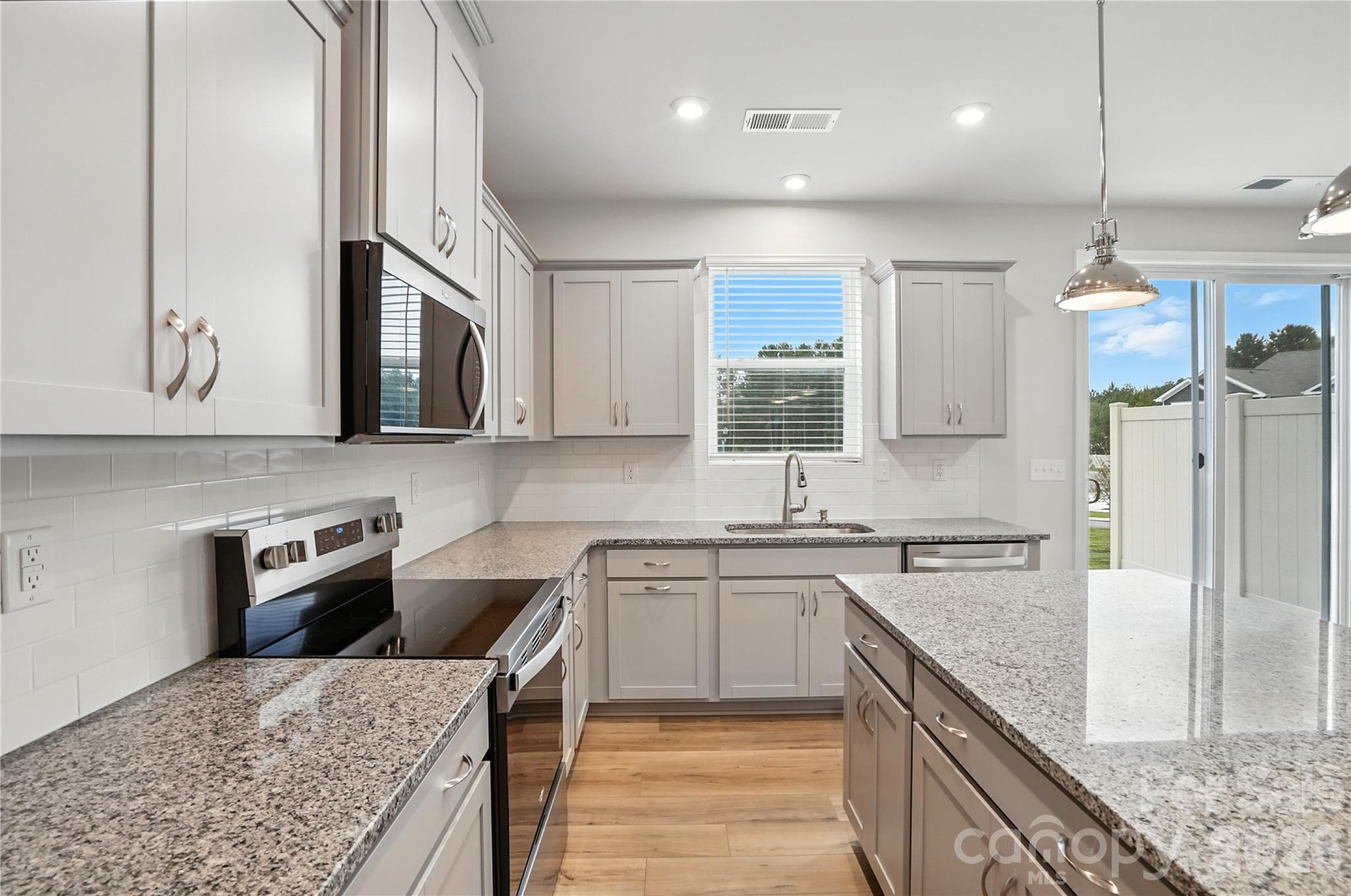 Welcome to The Amira, a beautifully designed townhome offering modern comfort and stylish living.  The first floor features a welcoming front porch and foyer, leading to an open and inviting gathering room.  The spacious kitchen boasts a walk-in pantry, ample counter space, and flows seamlessly into the breakfast dining area.  A powder room and access to the one-car garage add convenience, while the patio provides a perfect out door retreat.  

Upstairs, a large loft offers flexible living space.  The owner's suite is a true sanctuary with a walk-in closet and an en-suite bath featuring a shower with seat and dual vanity.  Two additional bedrooms, a full-size bathroom, linen closet, and laundry room complete the second floor.

With its thoughtful layout and modern finishes, The Amira is designed for effortless living.  Schedule your showing today!