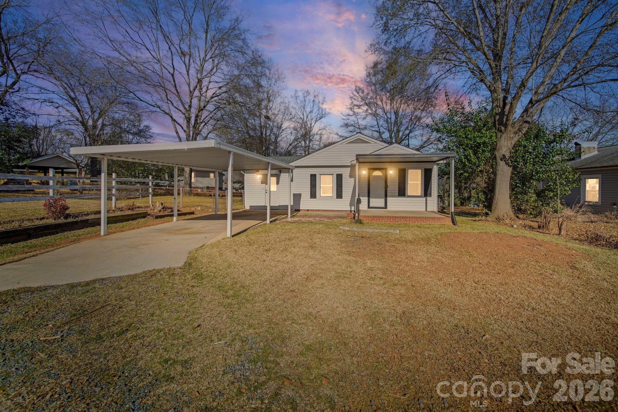 Looking for a little peace of heaven to call your next home, look no further. Fully updated ranch on a rare fenced 0.31-acre lot in Belmont! Move-in ready with major upgrades including a new roof (2025), all-new plumbing (2024), updated electrical (2019), Aqua Pure whole-home reverse osmosis water filtration system, and new flooring throughout. Features include abundant natural light, two living areas, custom built-ins, and an open kitchen with stainless appliances, pantry, breakfast area, and breakfast window. Updated bath offers marble flooring and built-in Bluetooth sound. Enjoy a covered front porch, multi-level deck, mature fruit trees, detached workshop/storage shed, and spacious fenced backyard. Conveniently located minutes from downtown Belmont’s shopping, dining, parks, and major highways. A rare combination of updates, character, outdoor space, and location!