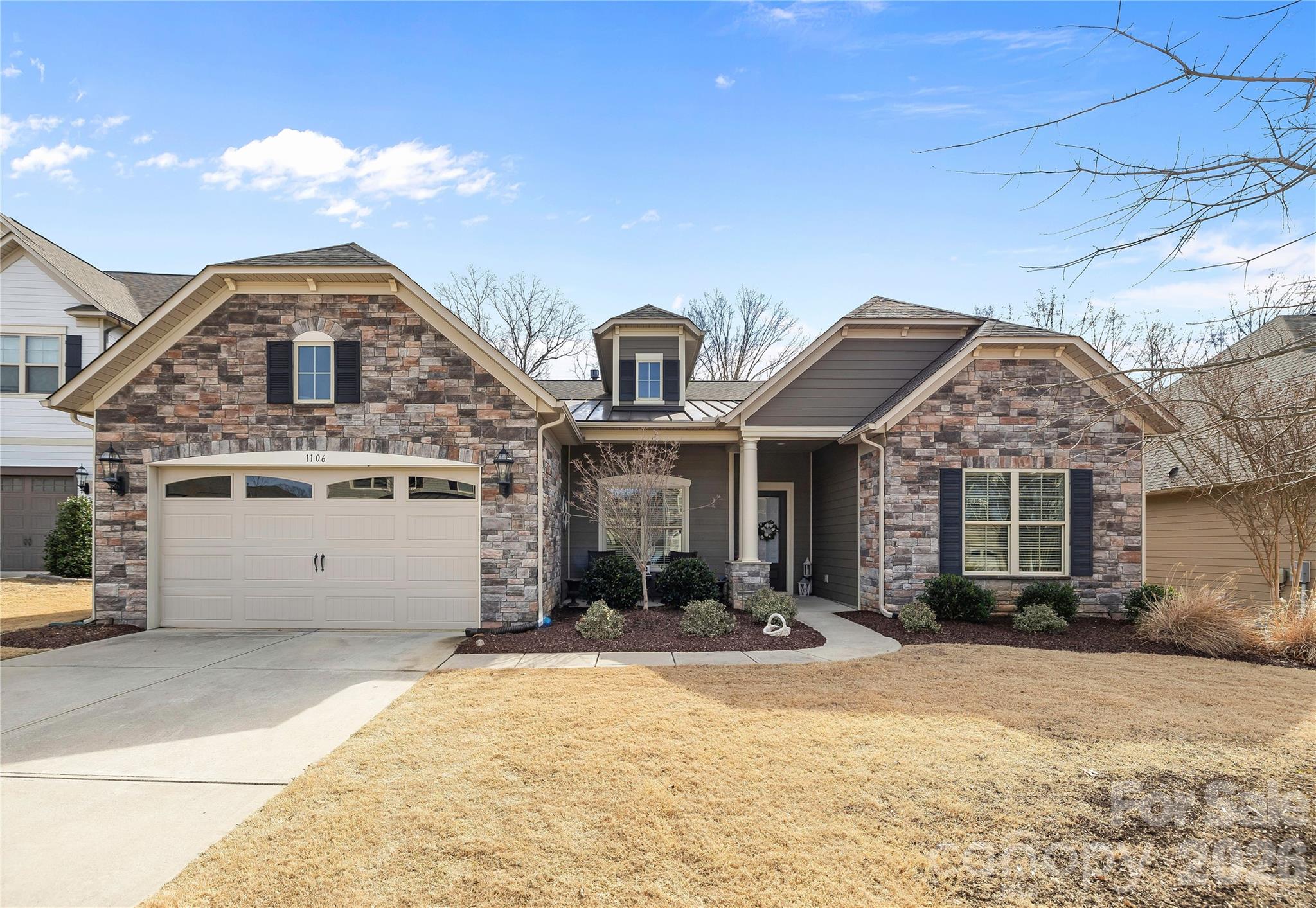 Welcome to 1106 Castle Road in the heart of Indian Land, SC — a beautifully maintained home offering thoughtful upgrades, flexible living space, and exceptional indoor-outdoor living.
Designed for both comfort and entertaining, the open floor plan centers around a stunning great room featuring a stacked stone mantel gas log fireplace — a true focal point that adds warmth and character. Natural light fills the main living areas, creating an inviting and comfortable atmosphere.
The kitchen is well-appointed with an oversized granite bar-stool island perfect for gatherings, stylish tile backsplash, gas cooktop with vented hood, walk-in pantry, and abundant cabinet storage. It flows seamlessly into the dining and living spaces, making everyday living effortless. The spacious primary suite serves as a private retreat, highlighted by a custom-designed walk-in closet with high-end built-ins for optimal organization. Just off the primary bedroom is a versatile flex space ideal for a home office, nursery, sitting area, fitness room, or easily converted into a third bedroom if desired. Bedroom 2 offers exceptional privacy and convenience with its own connecting full bath, making it ideal for guests. Additional functionality continues in the well-designed laundry room featuring a drop zone, utility sink, and cabinet storage — perfect for staying organized. Outdoor living is where this home truly shines. Step onto the screened porch, ideal for year-round enjoyment, which leads to a beautifully crafted paver patio complete with a hot tub feature — perfect for relaxing evenings or entertaining guests. The fully fenced backyard provides privacy and a secure space for pets or play. The garage is equipped with overhead storage racks for added organization and includes two 50-gallon electric water heaters, offering peace of mind and efficiency. Located in desirable Indian Land with convenient access to shopping, dining, and nearby Charlotte, this property combines flexible design, quality finishes, and outstanding indoor-outdoor living.
Schedule your private showing today and experience everything 1106 Castle Road has to offer.